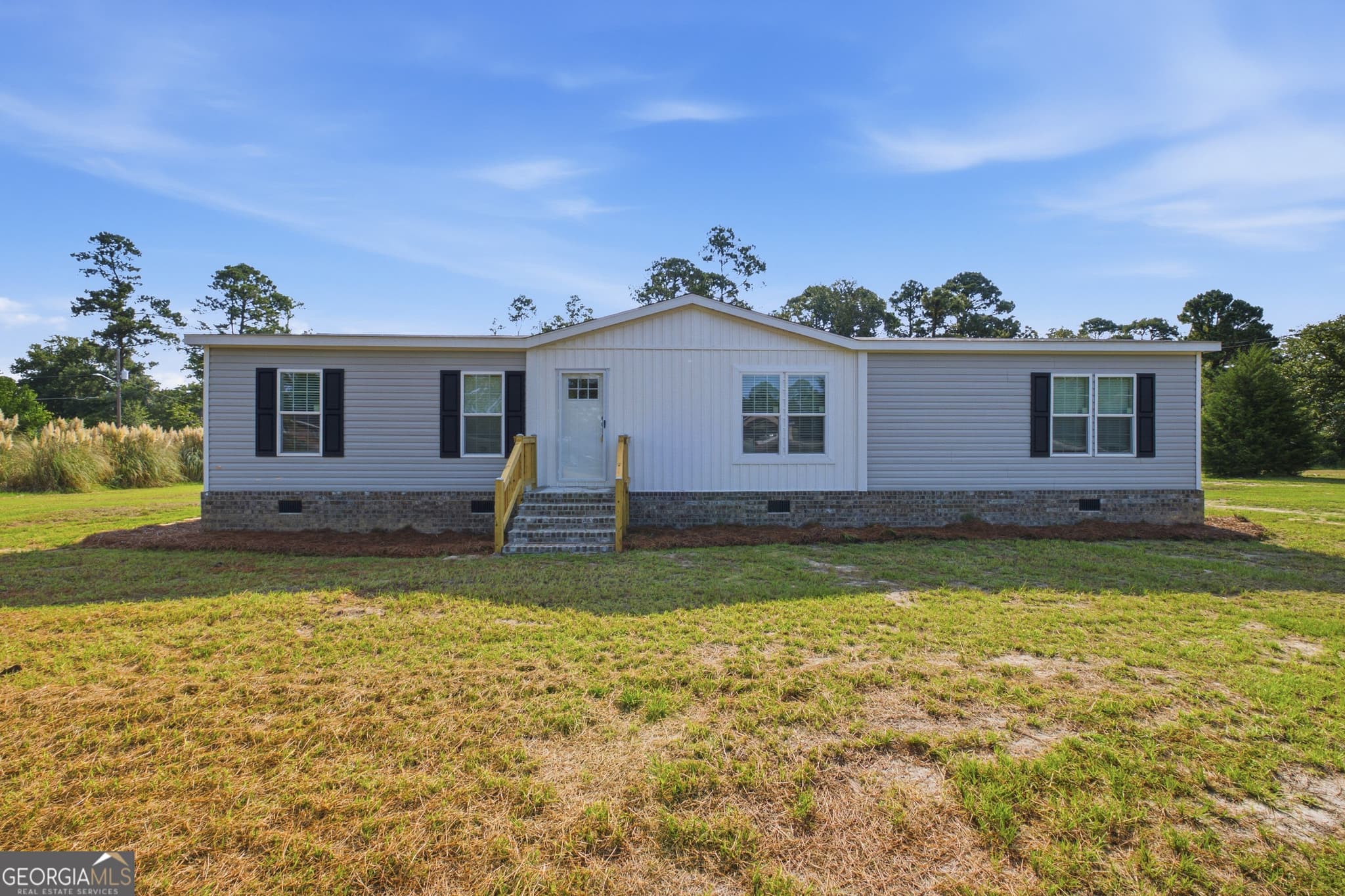 3 bedroom, 2 bathroom, 1,680 sq ft manufactured home,single family residence for sale at 1127 5th Avenue, Twin City, GA 30471