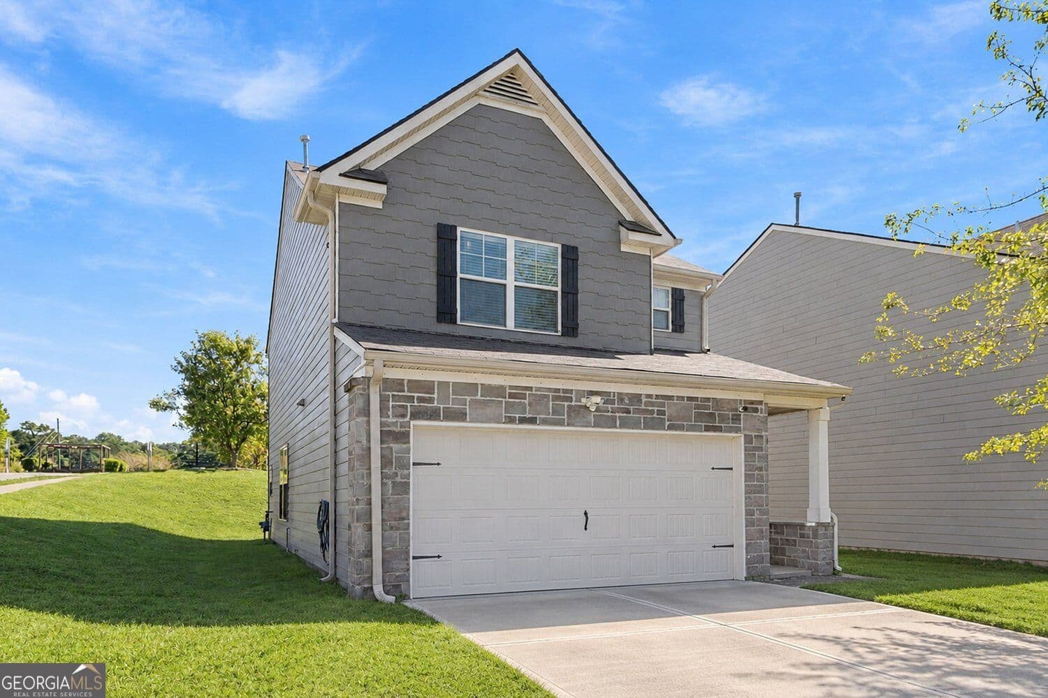 3 bedroom, 2.5 bathroom, 1,578 sq ft single family residence for sale at 5880 Seabright Lane, Atlanta, GA 30349 — photo 1 of 21