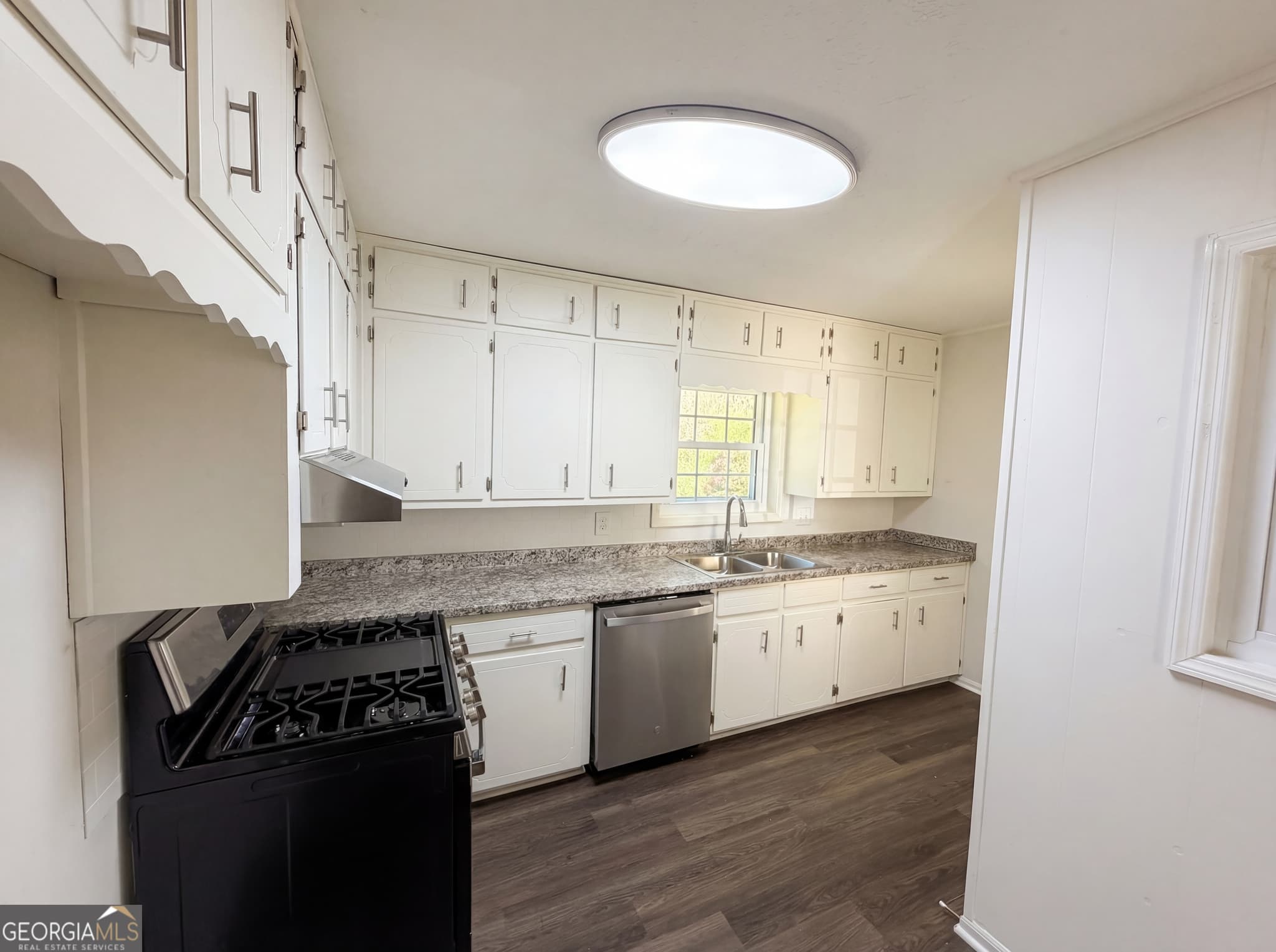 3 bedroom, 1.5 bathroom, 1,203 sq ft single family residence for sale at 1847 Mccollum Road, Conyers, GA 30094 — photo 6