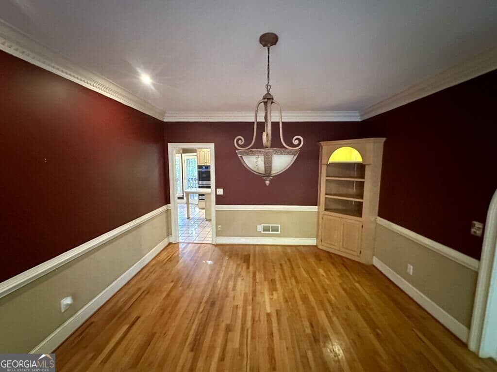 6 bedroom, 5 bathroom, 4,430 sq ft single family residence for sale at 4705 Riversound Drive, Snellville, GA 30039 — photo 6