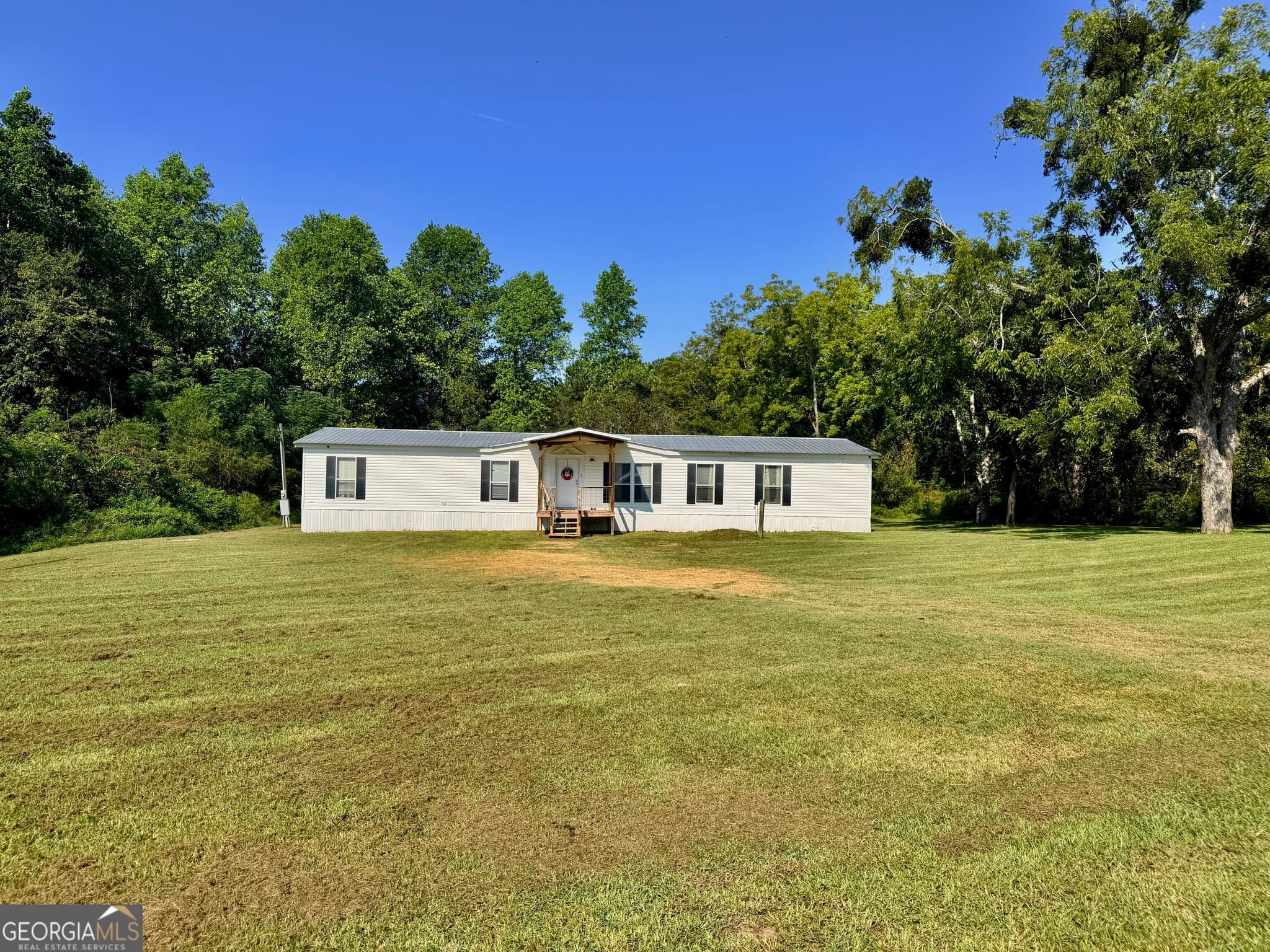 4 bedroom, 2 bathroom, 2,052 sq ft manufactured home,single family residence for sale at 17979 Kermit Road, Metter, GA 30439 — photo 2