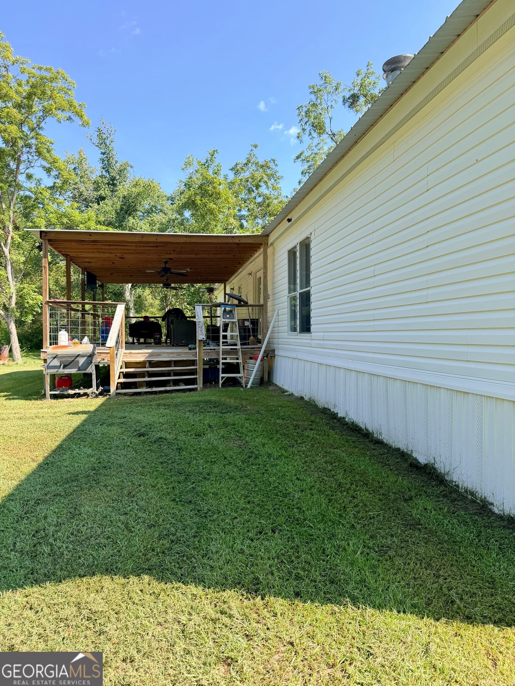 4 bedroom, 2 bathroom, 2,052 sq ft manufactured home,single family residence for sale at 17979 Kermit Road, Metter, GA 30439 — photo 4
