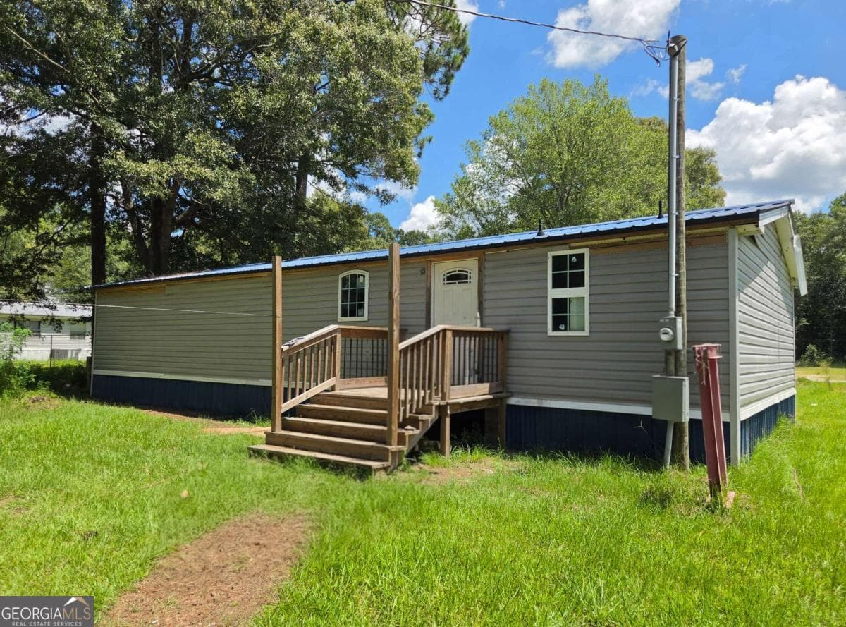 4 bedroom, 2 bathroom, 1,248 sq ft manufactured home,single family residence for sale at 135 Middlebrook Street, Fitzgerald, GA 31750 — photo 2