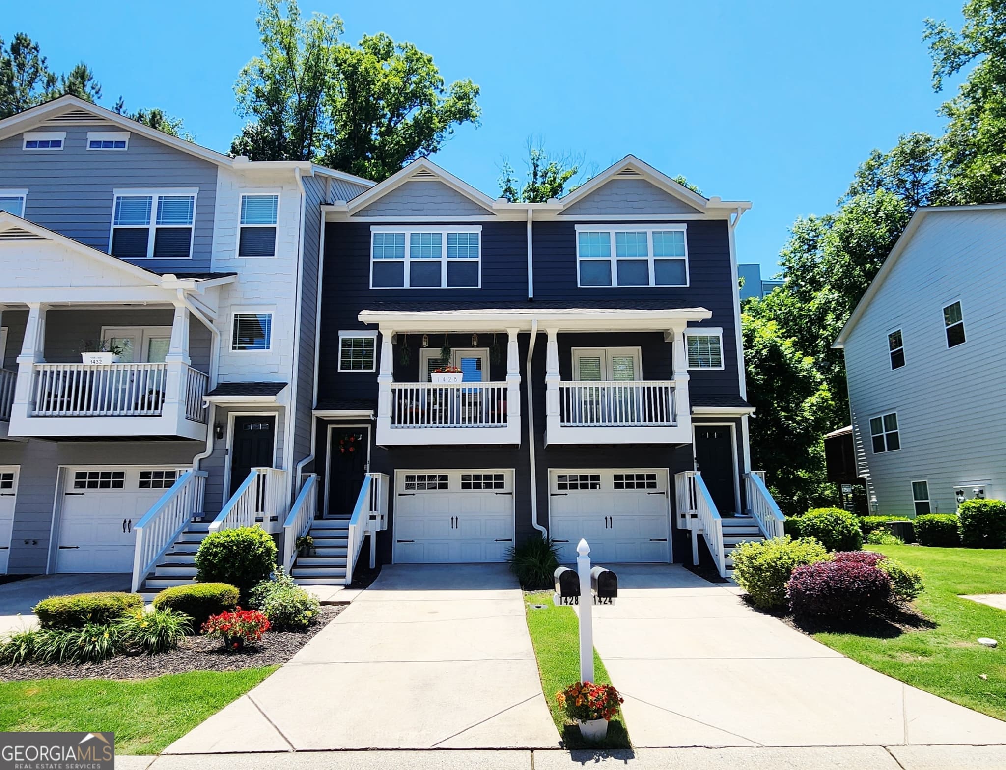 2 bedroom, 2.5 bathroom, 1,326 sq ft townhouse for sale at 1428 Liberty Parkway, Atlanta, GA 30318 — photo 1 of 37