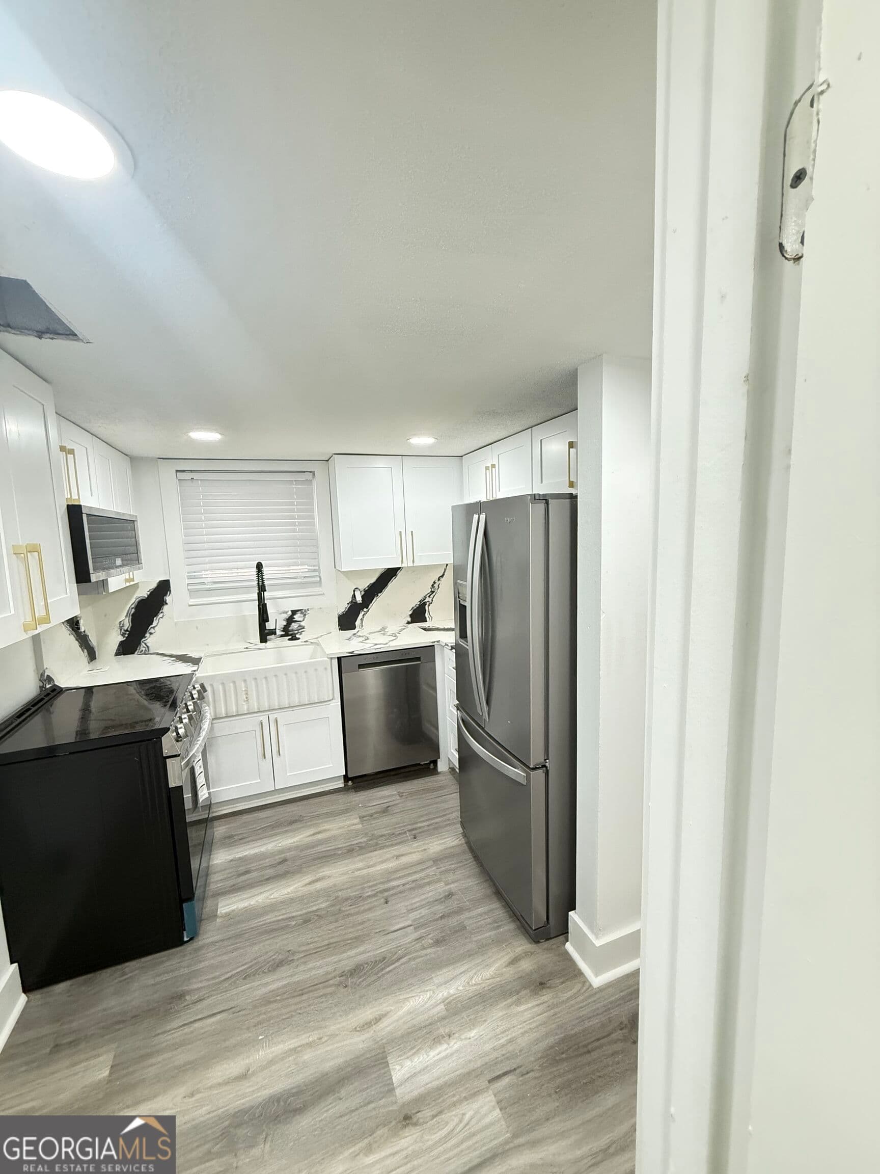 3 bedroom, 1.5 bathroom, 1,260 sq ft townhouse for sale at 621 Garden Walk Drive, Stone Mountain, GA 30083 — photo 9