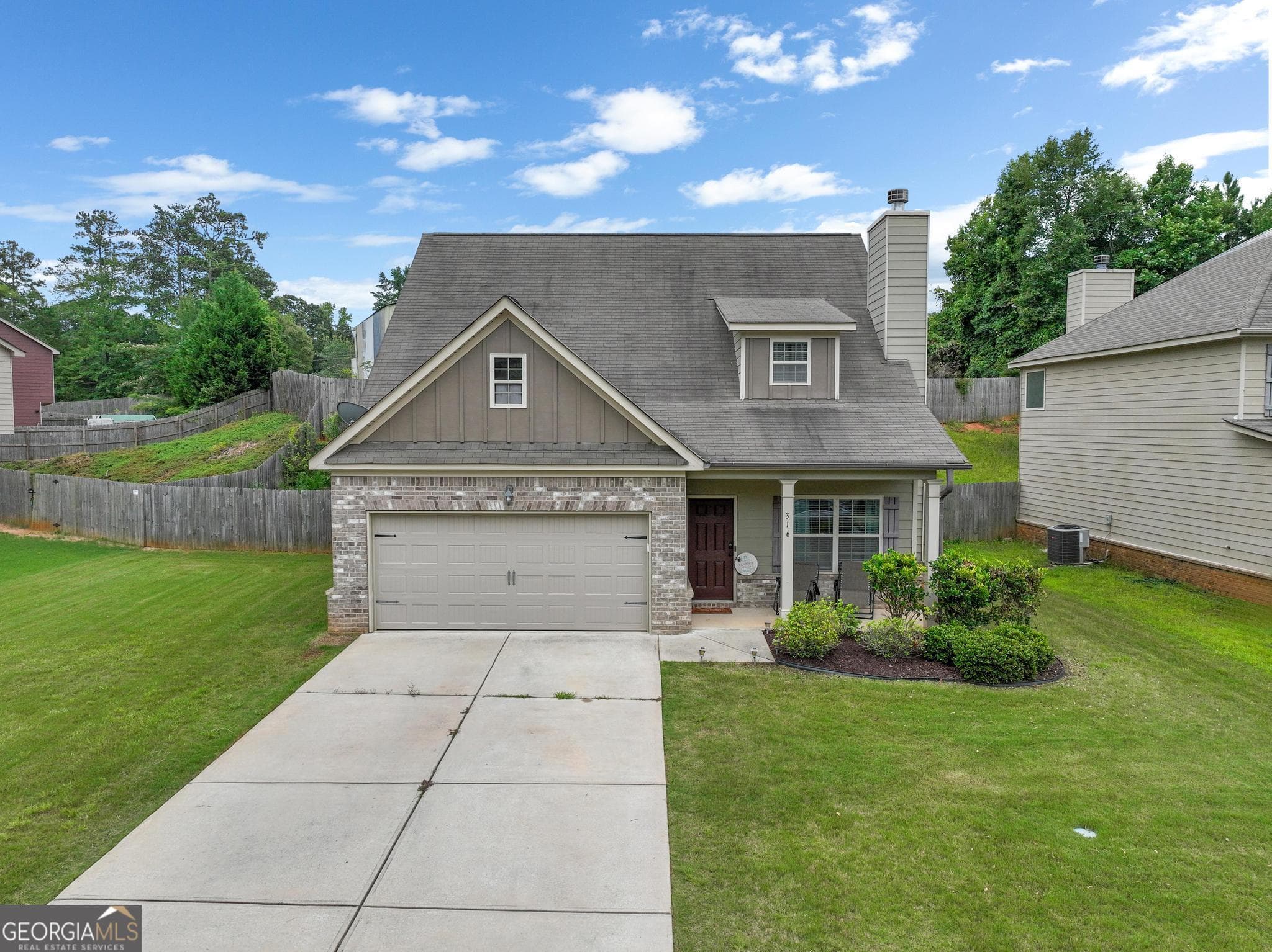 4 bedroom, 3 bathroom, 1,995 sq ft single family residence for sale at 316 Maddi Grace Court, Locust Grove, GA 30248 — photo 2