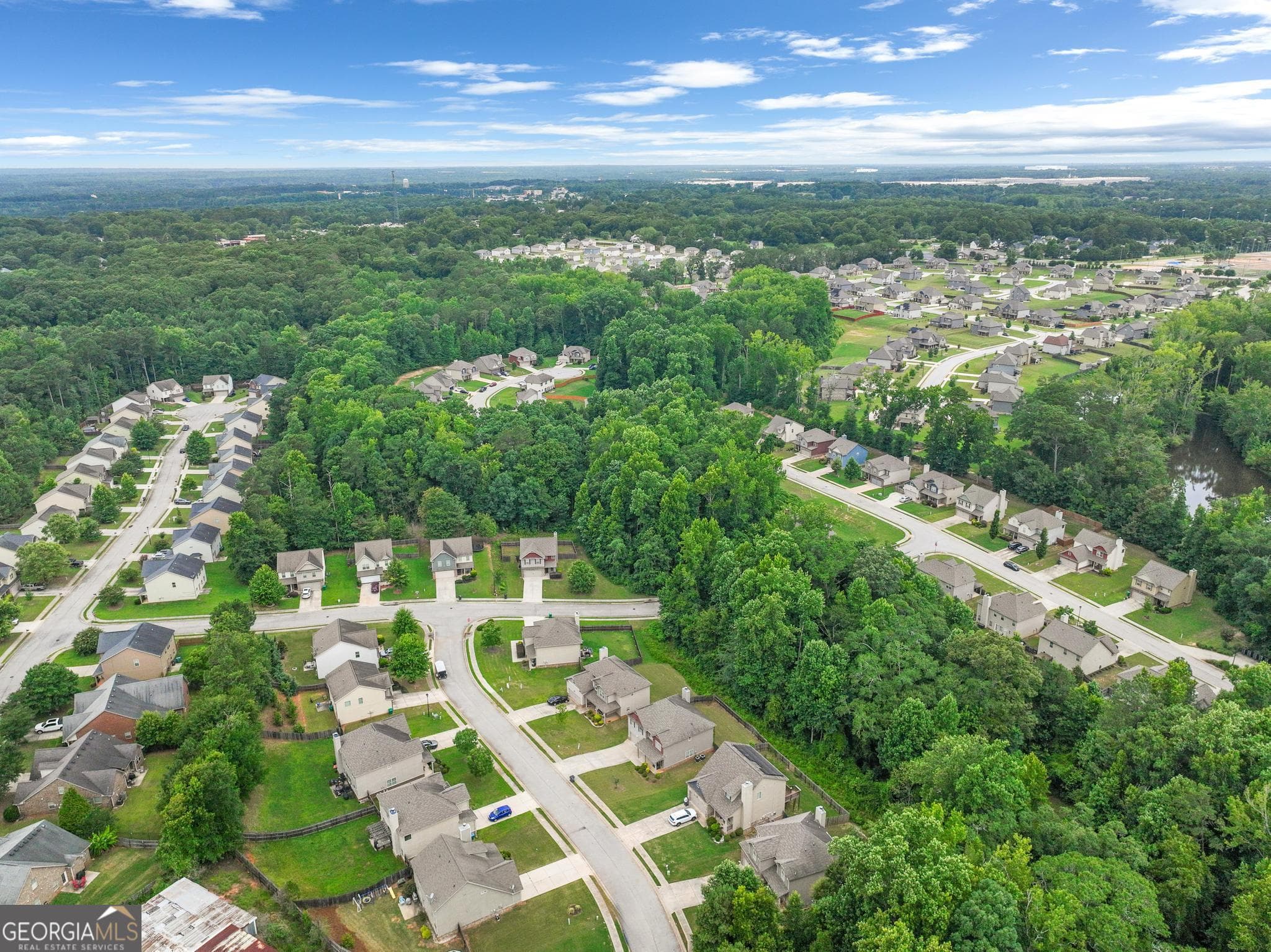 4 bedroom, 3 bathroom, 1,995 sq ft single family residence for sale at 316 Maddi Grace Court, Locust Grove, GA 30248 — photo 4