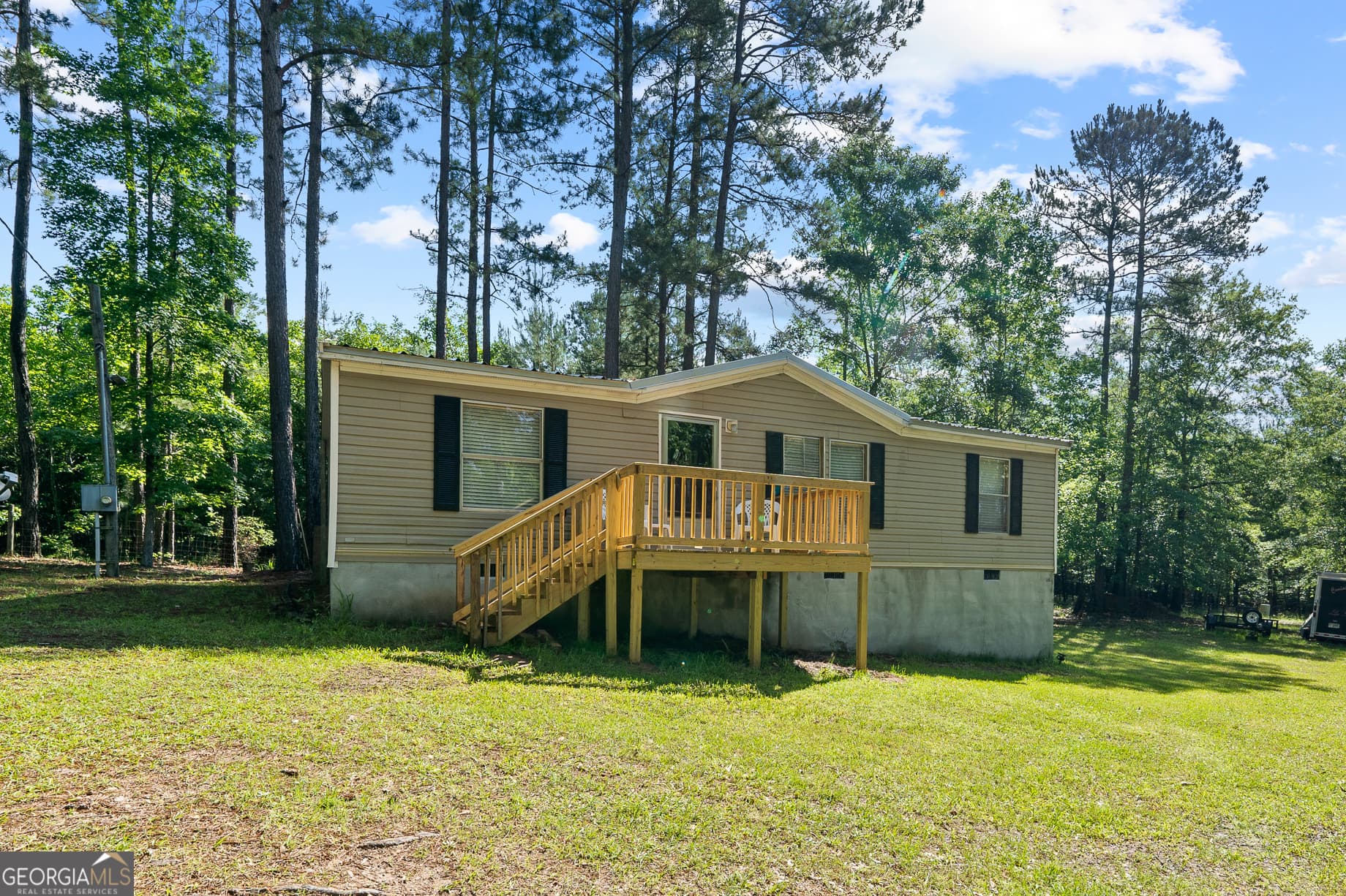 3 bedroom, 2 bathroom, 1,080 sq ft manufactured home,single family residence for sale at 657 Rockville Springs Drive, Eatonton, GA 31024 — photo 2