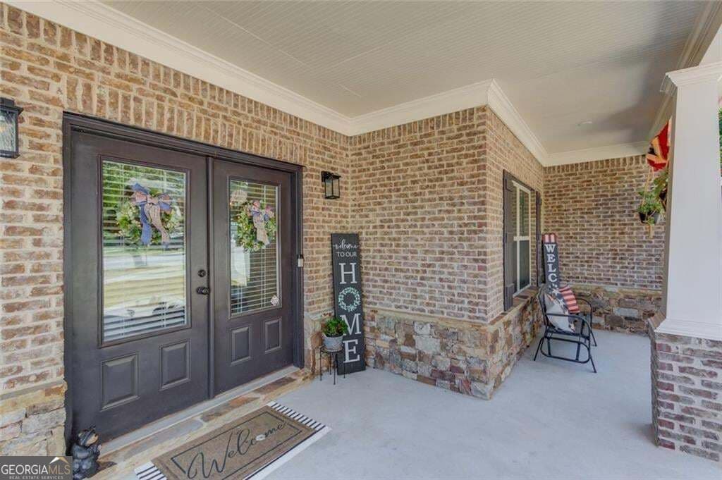 4 bedroom, 3 bathroom, 2,821 sq ft single family residence for sale at 5601 Creek Dale Way, Buford, GA 30518 — photo 2