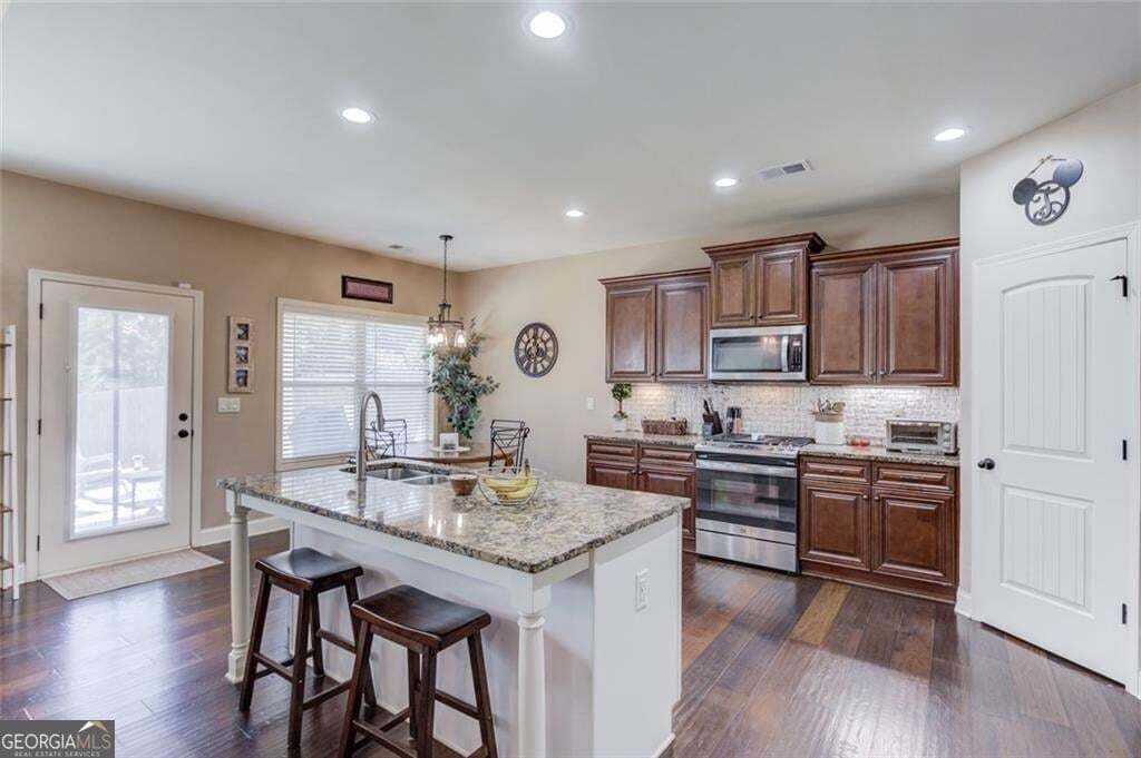 4 bedroom, 3 bathroom, 2,821 sq ft single family residence for sale at 5601 Creek Dale Way, Buford, GA 30518 — photo 9