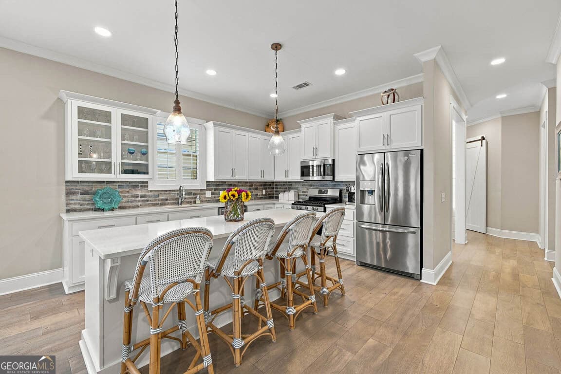 4 bedroom, 2.5 bathroom, 2,302 sq ft single family residence for sale at 108 Ramsey Lane, St. Simons, GA 31522 — photo 10