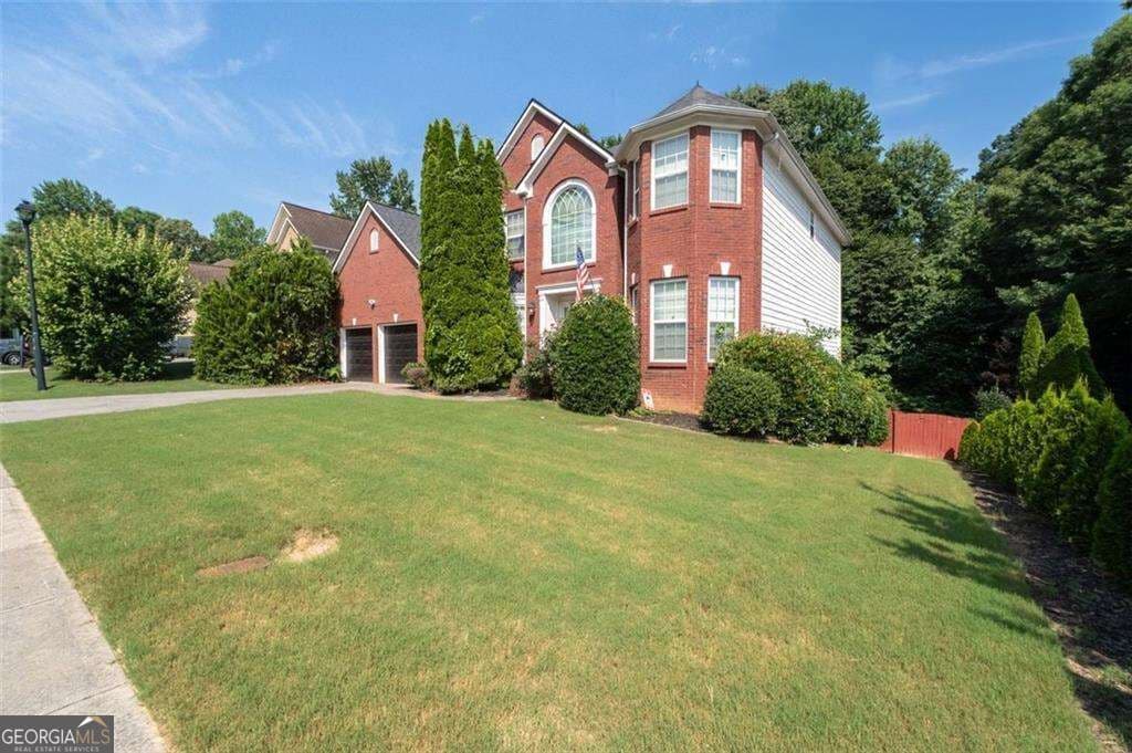 6 bedroom, 5 bathroom, 5,108 sq ft single family residence for sale at 2989 Heritage Oaks Circle, Dacula, GA 30019 — photo 3