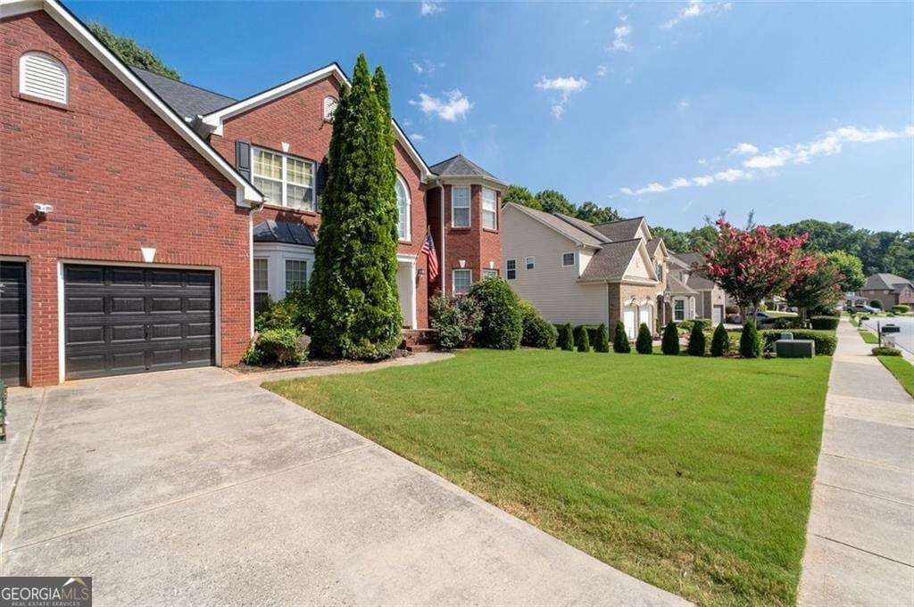 6 bedroom, 5 bathroom, 5,108 sq ft single family residence for sale at 2989 Heritage Oaks Circle, Dacula, GA 30019 — photo 4