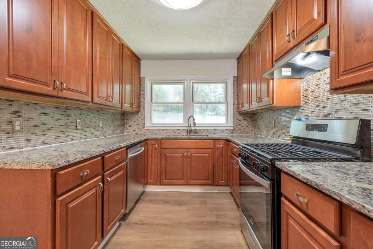 4 bedroom, 2 bathroom, 1,014 sq ft single family residence for sale at 2756 Homeland Drive, Atlanta, GA 30360 — photo 3