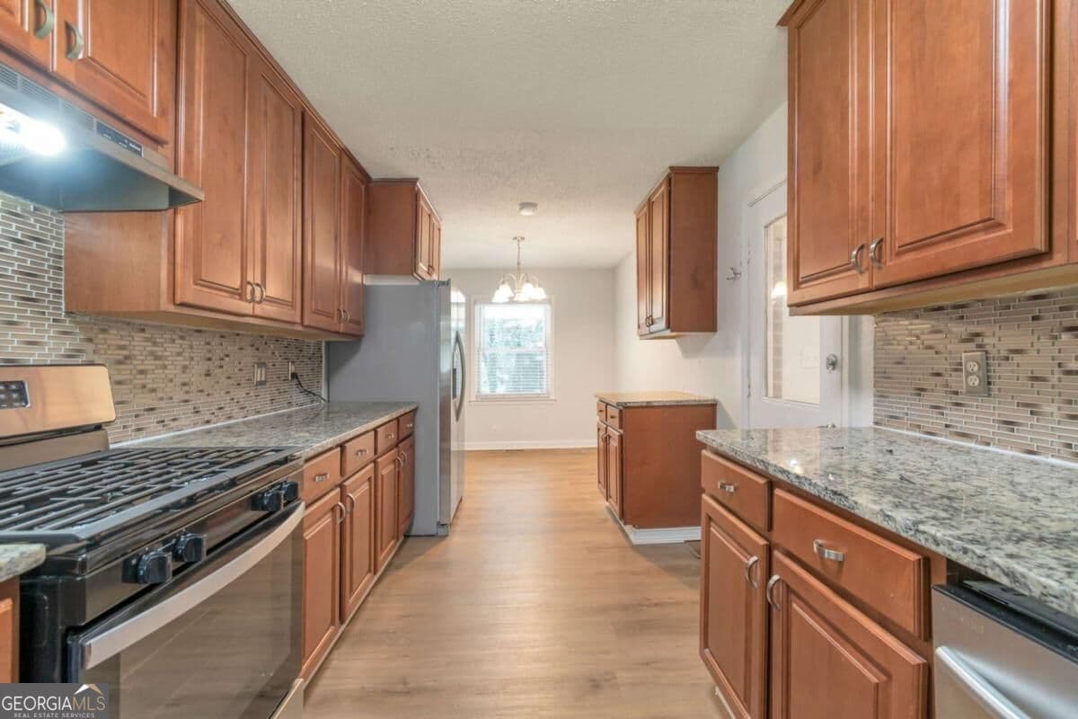 4 bedroom, 2 bathroom, 1,014 sq ft single family residence for sale at 2756 Homeland Drive, Atlanta, GA 30360 — photo 4