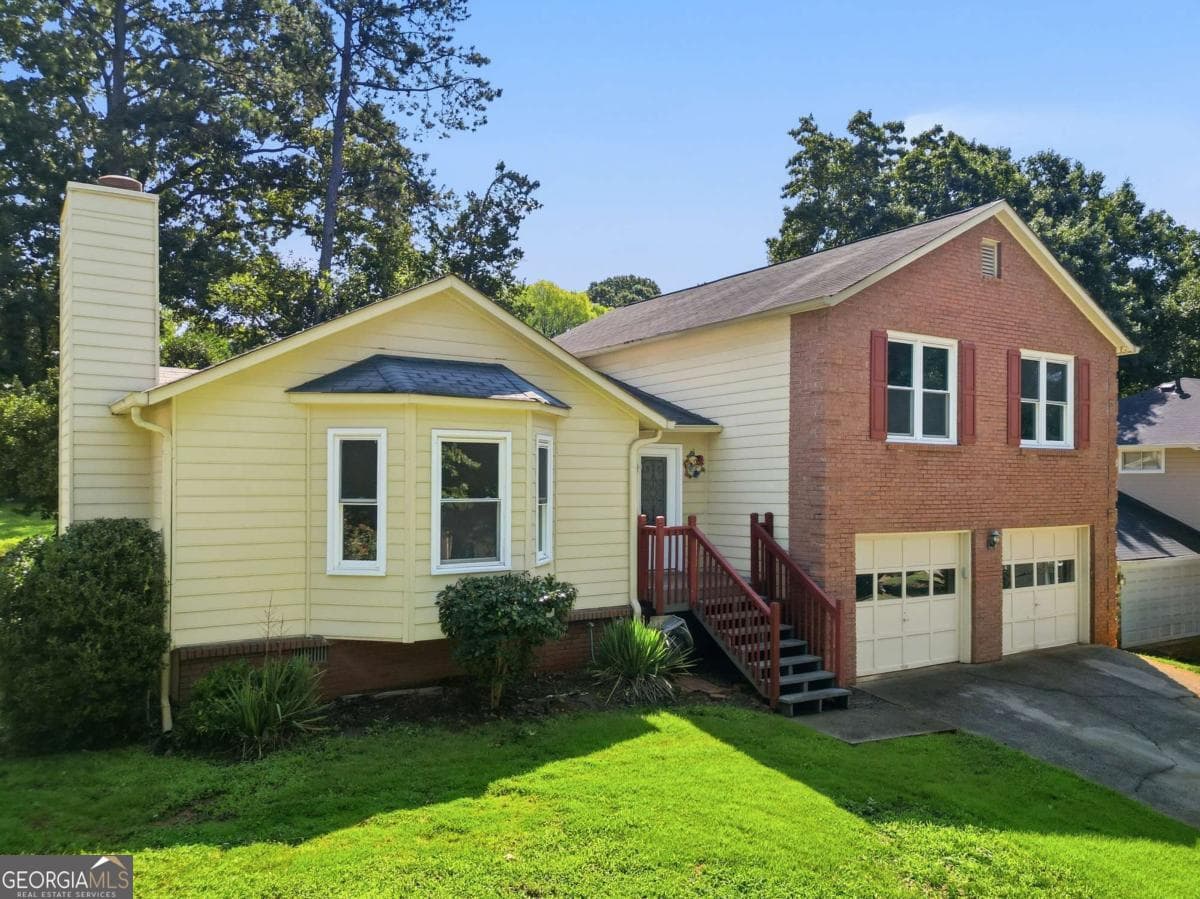 4 bedroom, 3 bathroom single family residence for sale at 440 Hunters Cove Court, Lawrenceville, GA 30044 — photo 3
