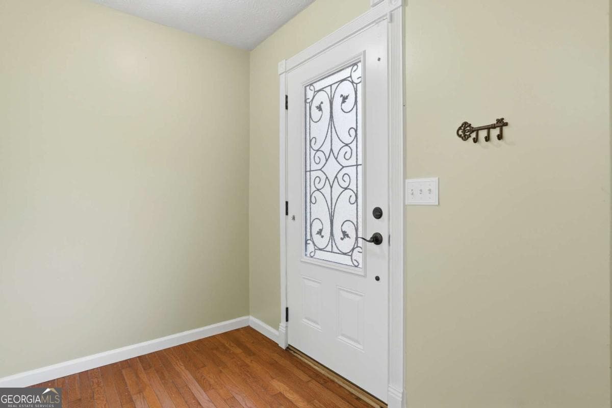 4 bedroom, 3 bathroom single family residence for sale at 440 Hunters Cove Court, Lawrenceville, GA 30044 — photo 5