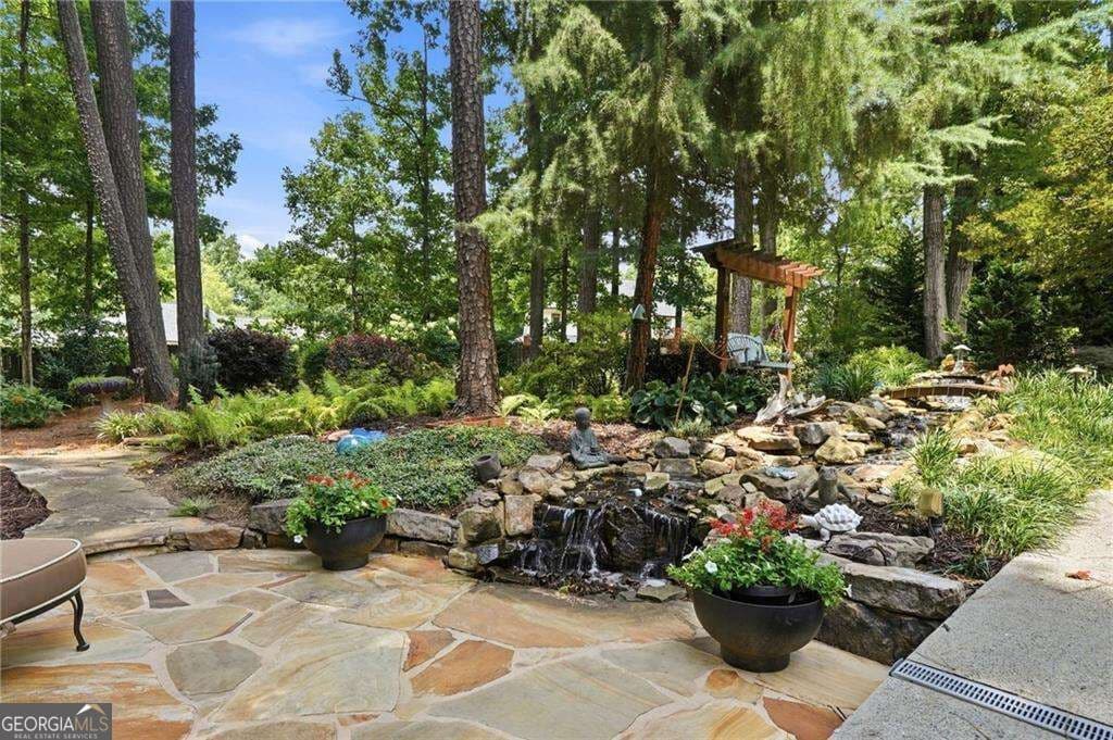 4 bedroom, 4.5 bathroom, 4,723 sq ft single family residence for sale at 765 Wheeler Peak Way, Johns Creek, GA 30022 — photo 2