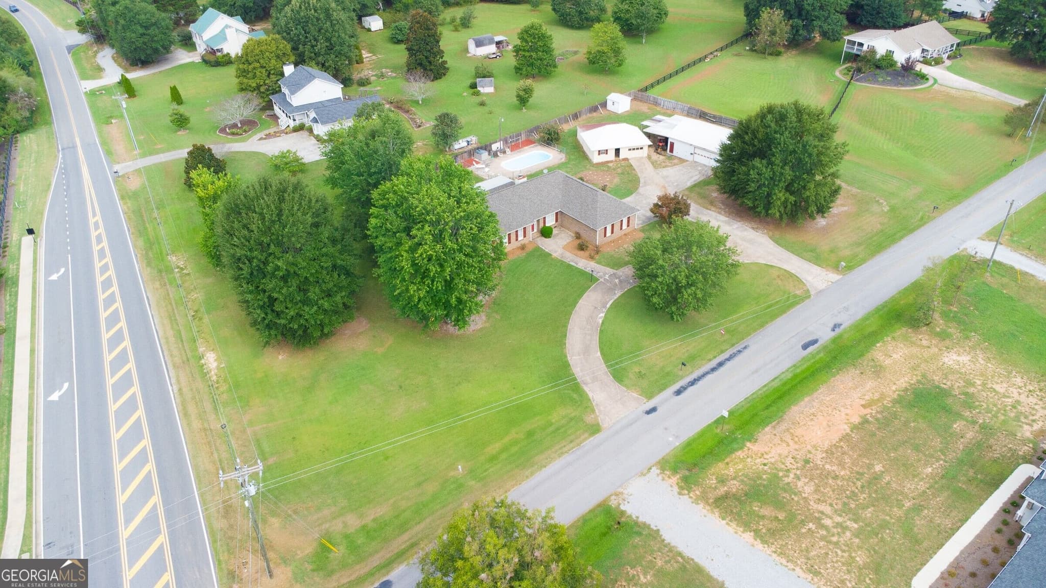 4 bedroom, 3.5 bathroom single family residence for sale at 7525 Blacks Mill Road, Dawsonville, GA 30534 — photo 2