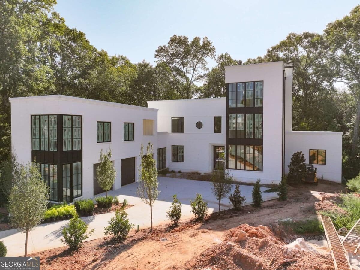 5 bedroom, 7 bathroom, 5,929 sq ft single family residence for sale at 140 Reed Way, Fayetteville, GA 30214 — photo 2