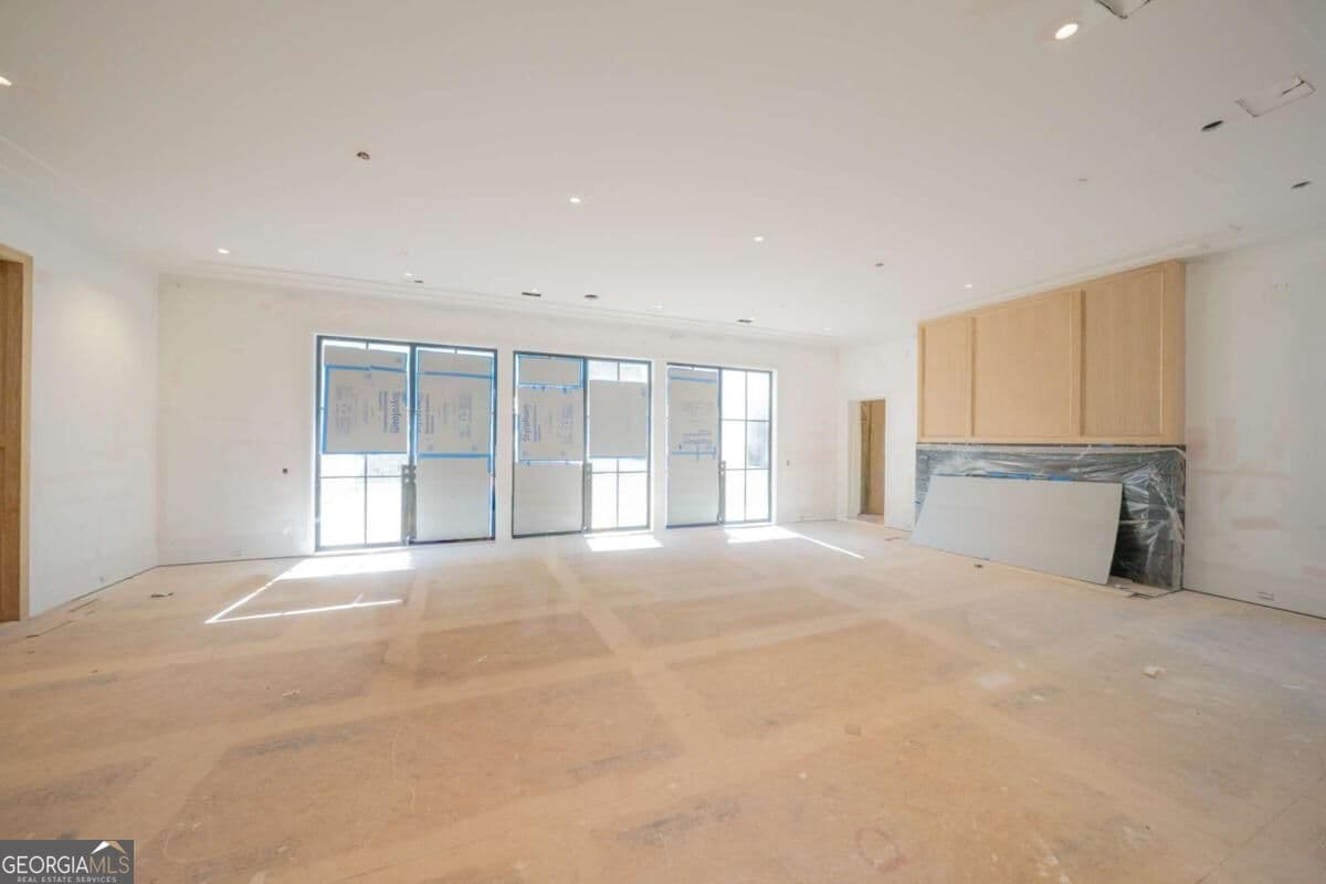 5 bedroom, 7 bathroom, 5,929 sq ft single family residence for sale at 140 Reed Way, Fayetteville, GA 30214 — photo 7