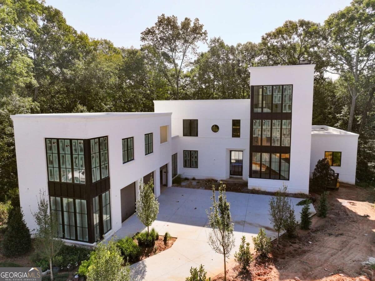 5 bedroom, 7 bathroom, 5,929 sq ft single family residence for sale at 140 Reed Way, Fayetteville, GA 30214 — photo 3
