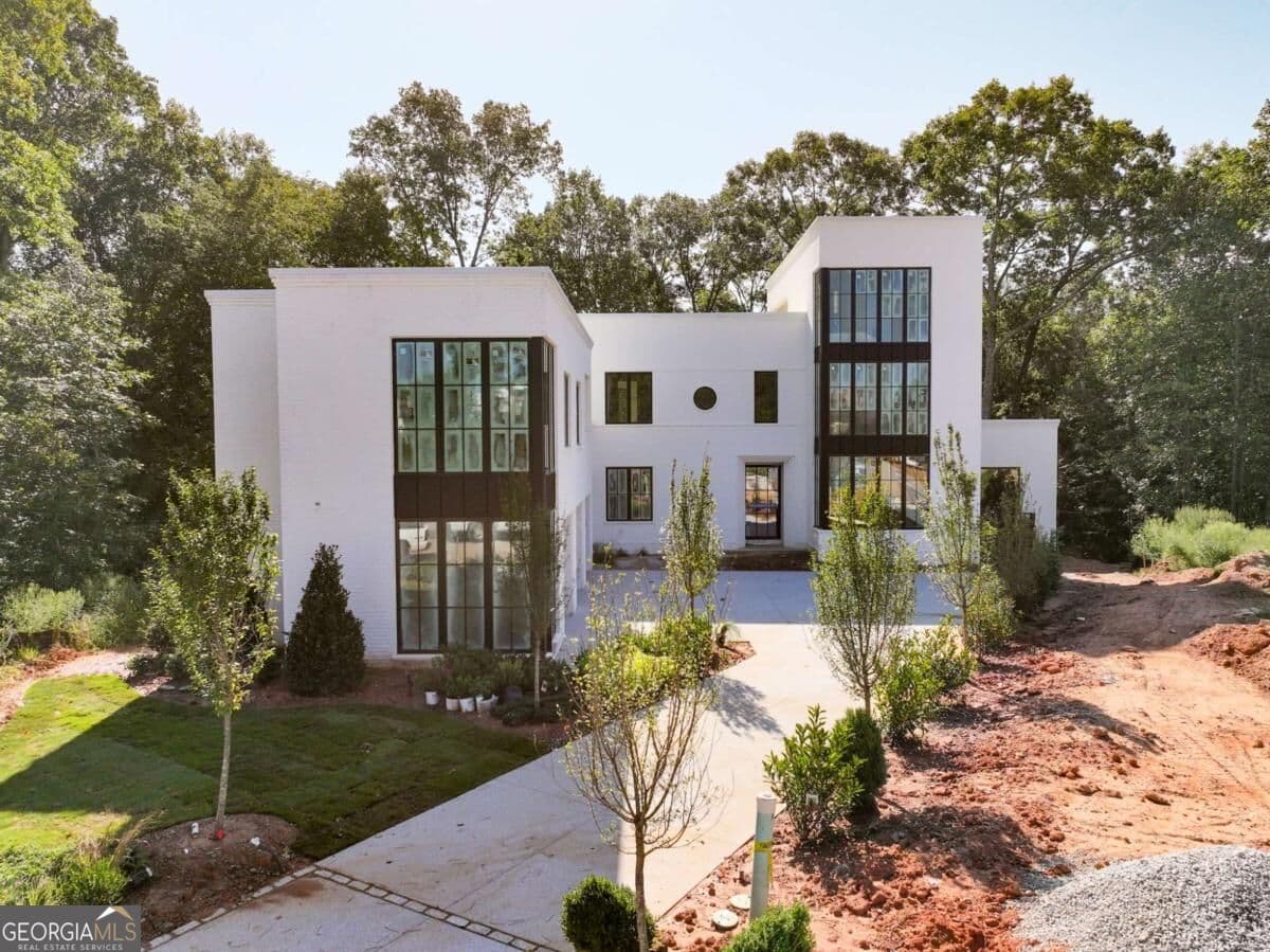 5 bedroom, 7 bathroom, 5,929 sq ft single family residence for sale at 140 Reed Way, Fayetteville, GA 30214