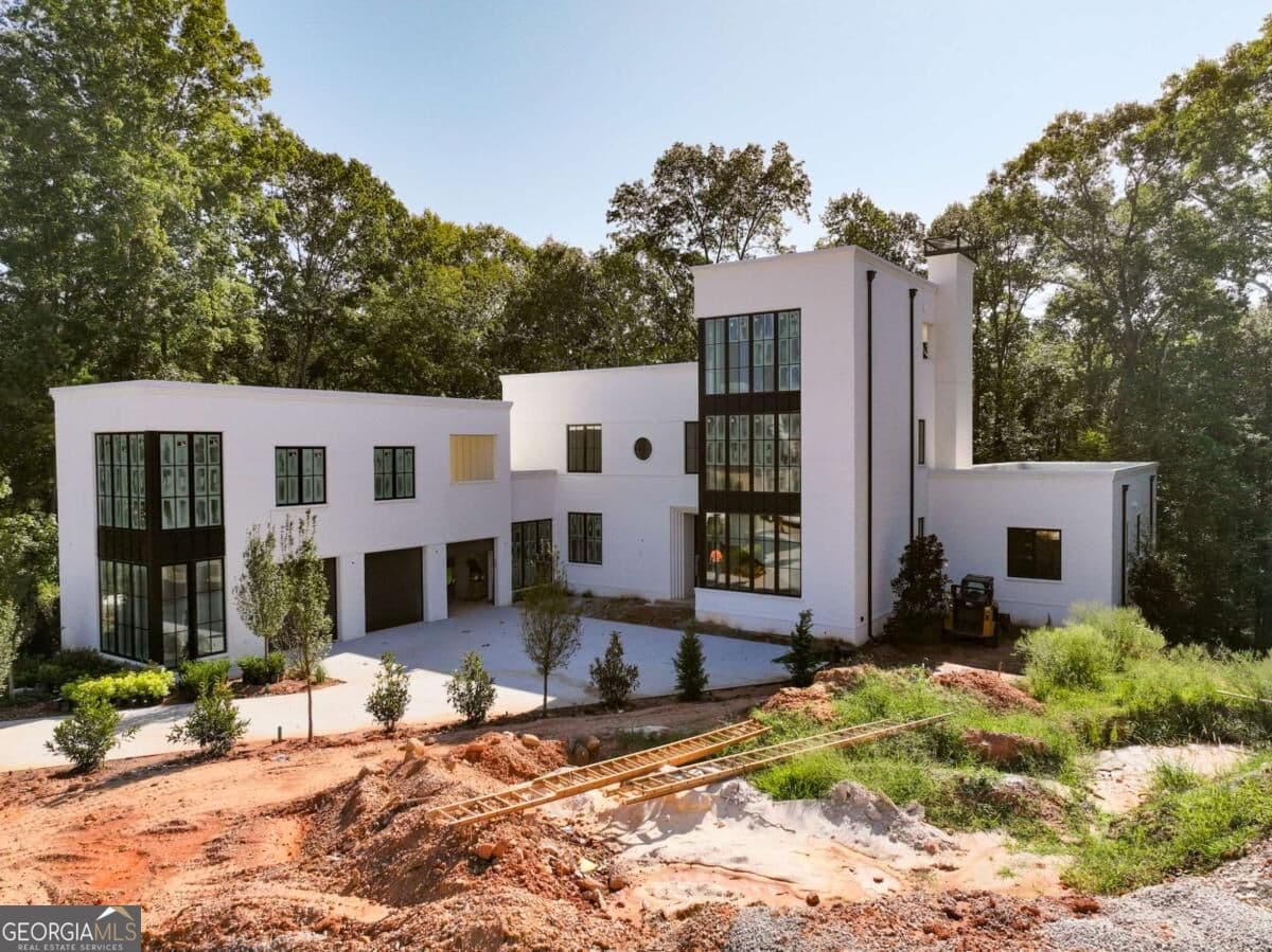 5 bedroom, 7 bathroom, 5,929 sq ft single family residence for sale at 140 Reed Way, Fayetteville, GA 30214 — photo 4