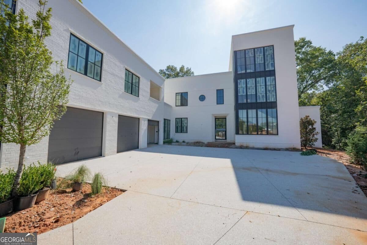 5 bedroom, 7 bathroom, 5,929 sq ft single family residence for sale at 140 Reed Way, Fayetteville, GA 30214 — photo 8