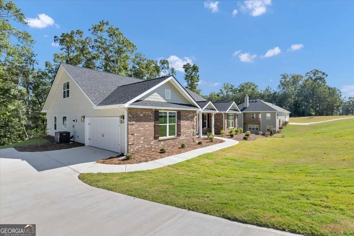5 bedroom, 3.5 bathroom, 3,040 sq ft single family residence for sale at 3390 Trevi Trail, Douglasville, GA 30135 — photo 2
