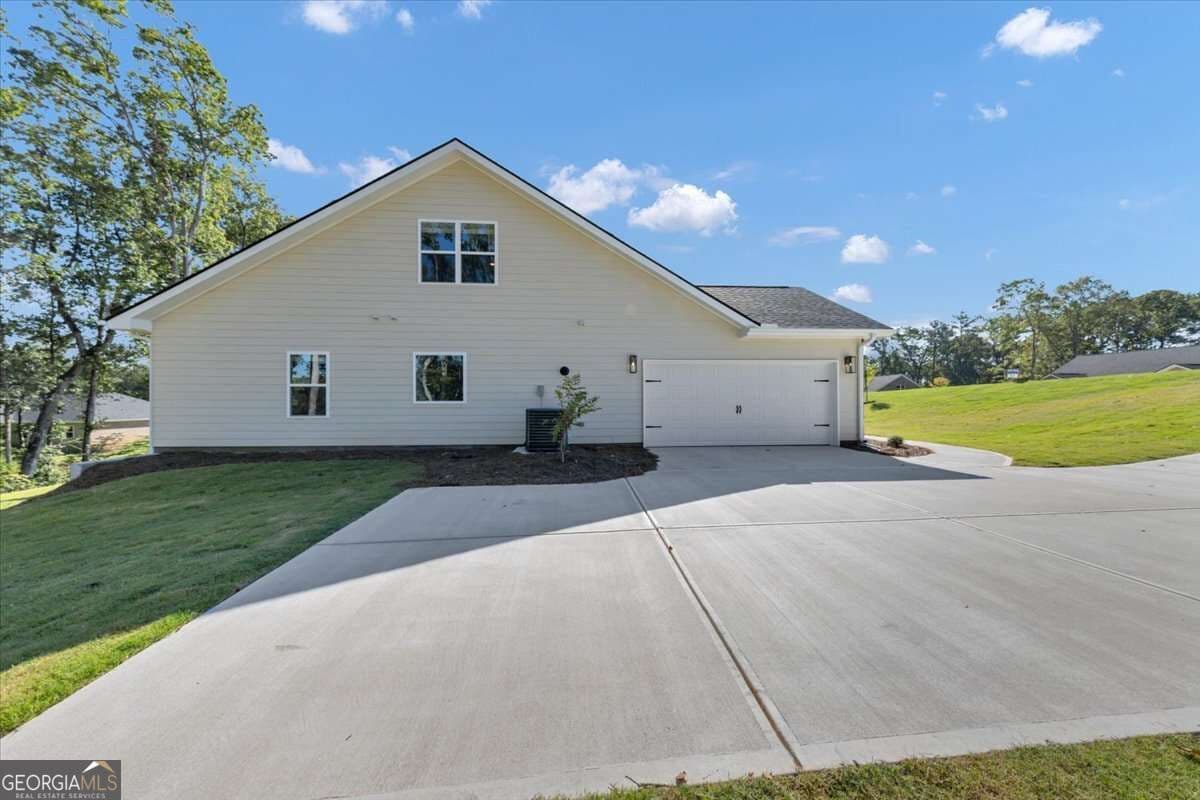 5 bedroom, 3.5 bathroom, 3,040 sq ft single family residence for sale at 3390 Trevi Trail, Douglasville, GA 30135 — photo 3