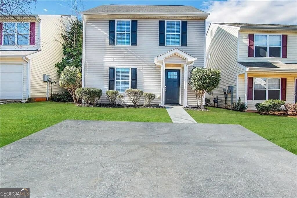 3 bedroom, 2.5 bathroom, 1,400 sq ft single family residence for sale at 411 Kara Lane, Mcdonough, GA 30253 — photo 1 of 13