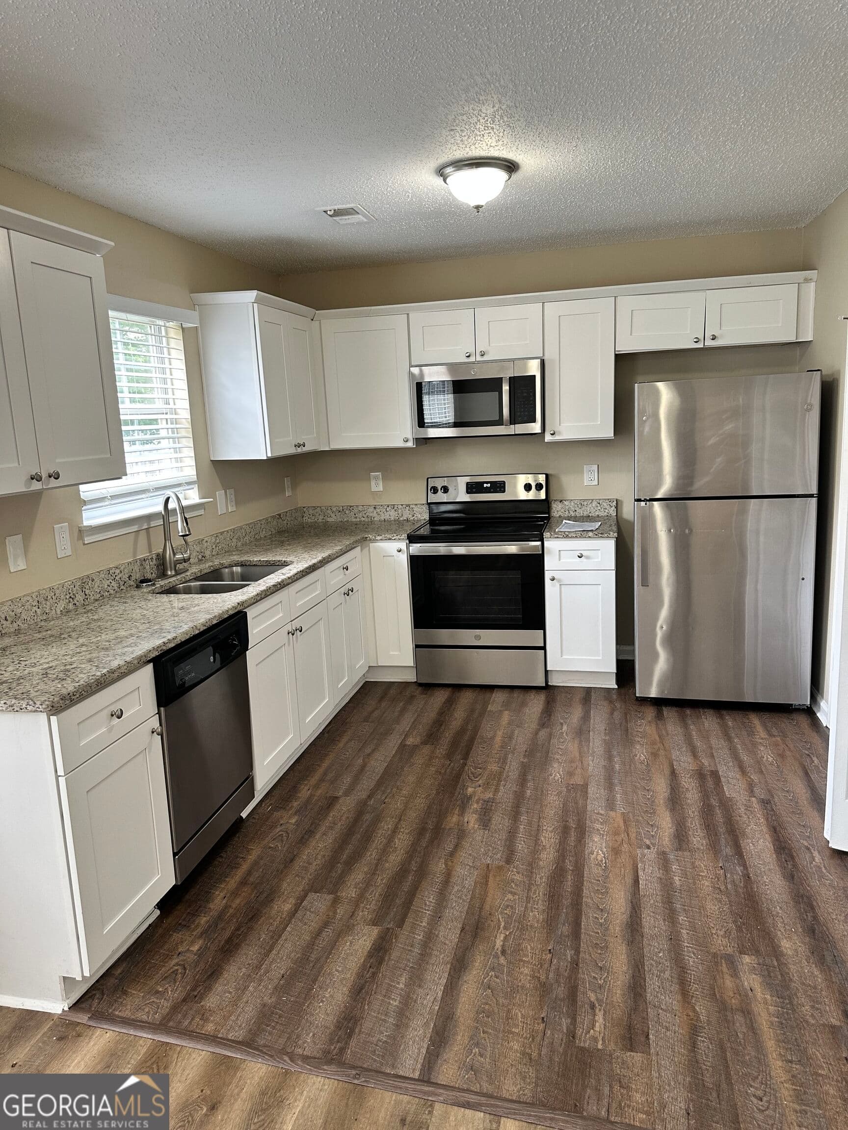 3 bedroom, 2.5 bathroom, 1,400 sq ft single family residence for sale at 411 Kara Lane, Mcdonough, GA 30253 — photo 4