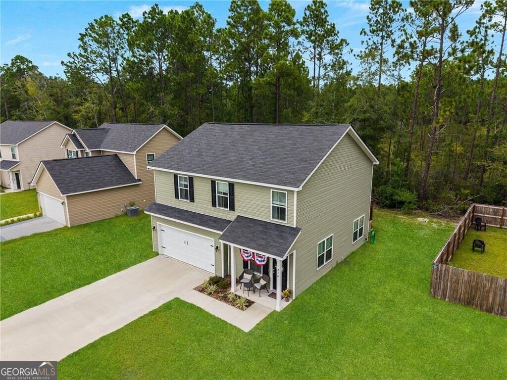 4 bedroom, 2.5 bathroom, 1,743 sq ft single family residence for sale at 716 Mill Creek Circle, Hinesville, GA 31313 — photo 2