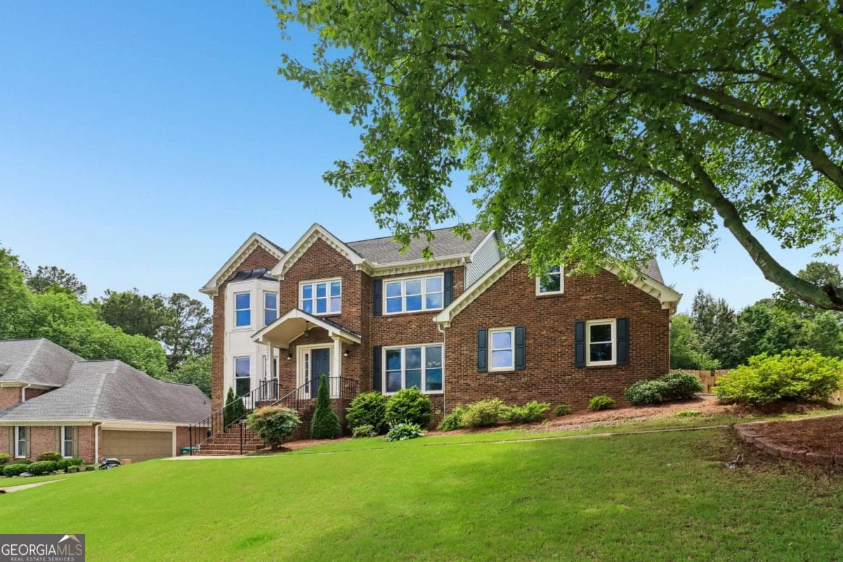 5 bedroom, 3.5 bathroom, 4,028 sq ft single family residence sold at 2442 Player Court, Duluth, GA 30096