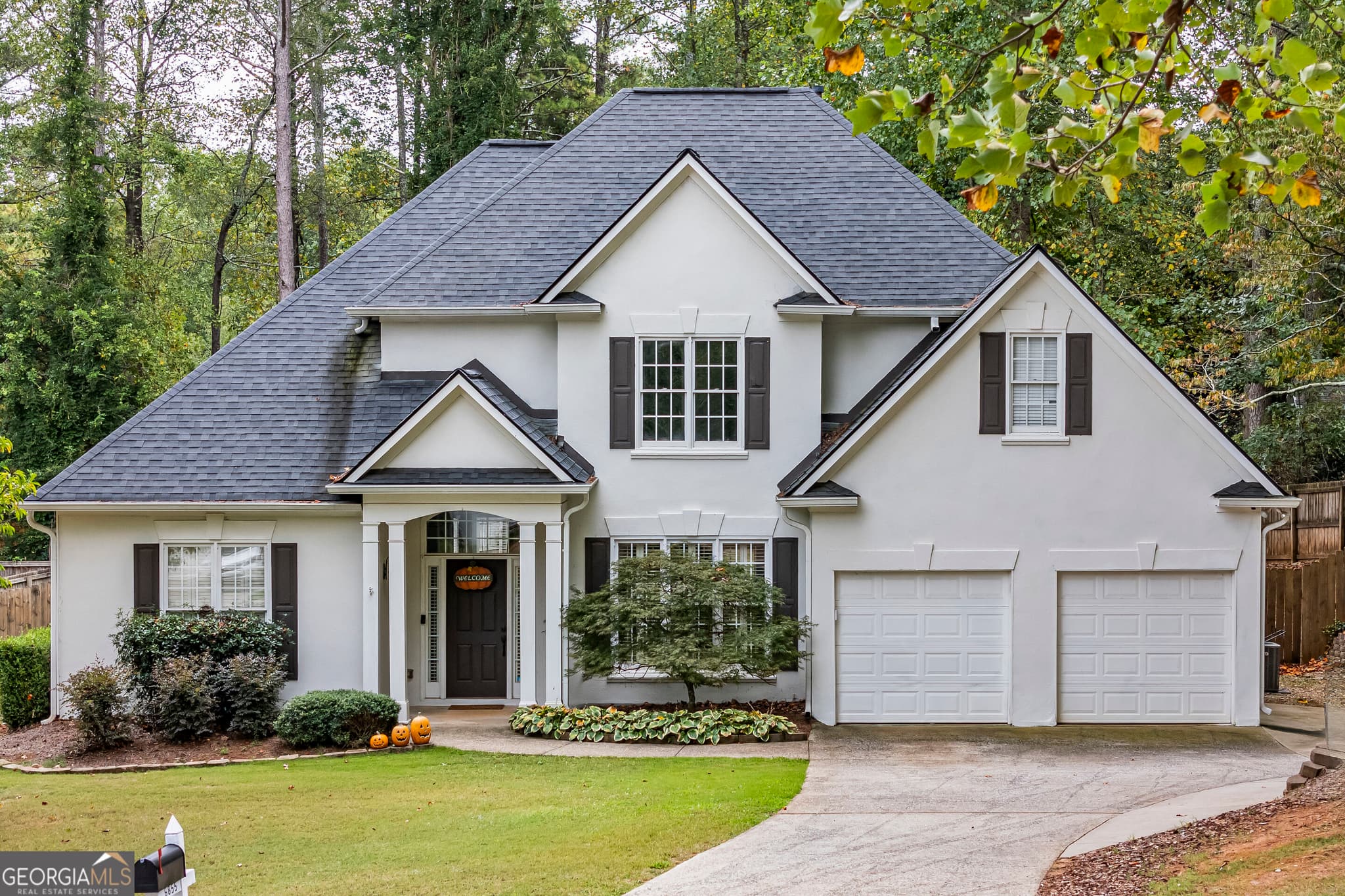 4 bedroom, 2.5 bathroom, 2,062 sq ft single family residence for sale at 6855 Fox Creek Drive, Cumming, GA 30040 — photo 1 of 58