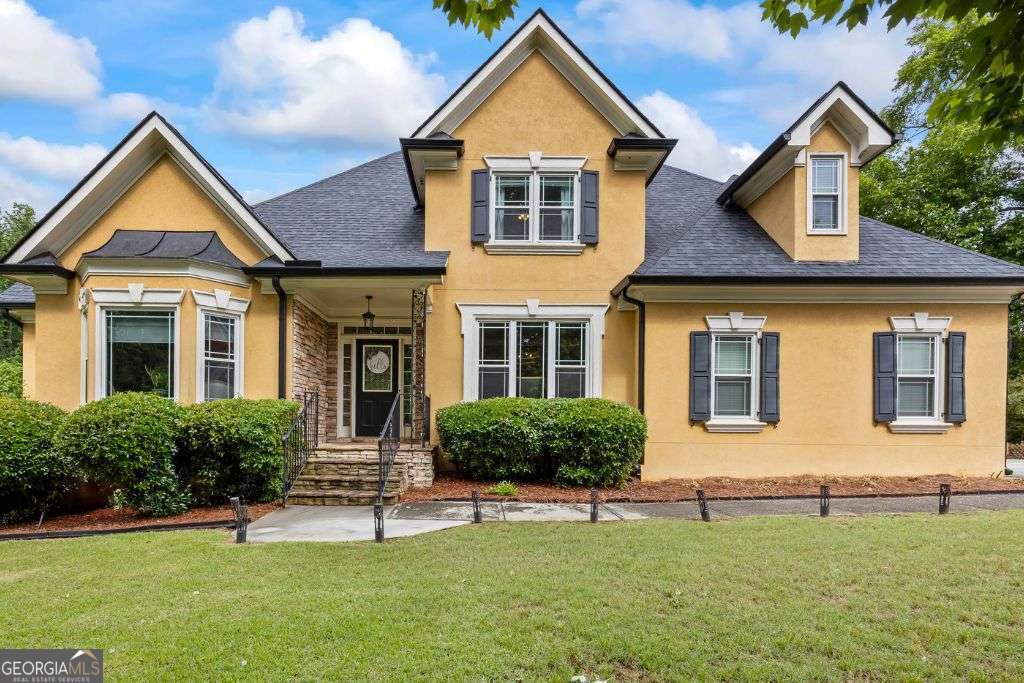 5 bedroom, 4 bathroom, 4,884 sq ft single family residence sold at 4720 Winding Rose Drive, Suwanee, GA 30024