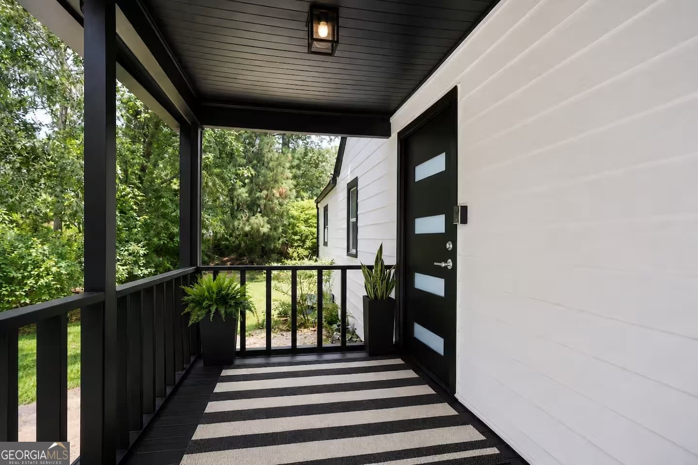 3 bedroom, 2 bathroom single family residence for sale at 2097 Baker Road, Atlanta, GA 30318 — photo 2