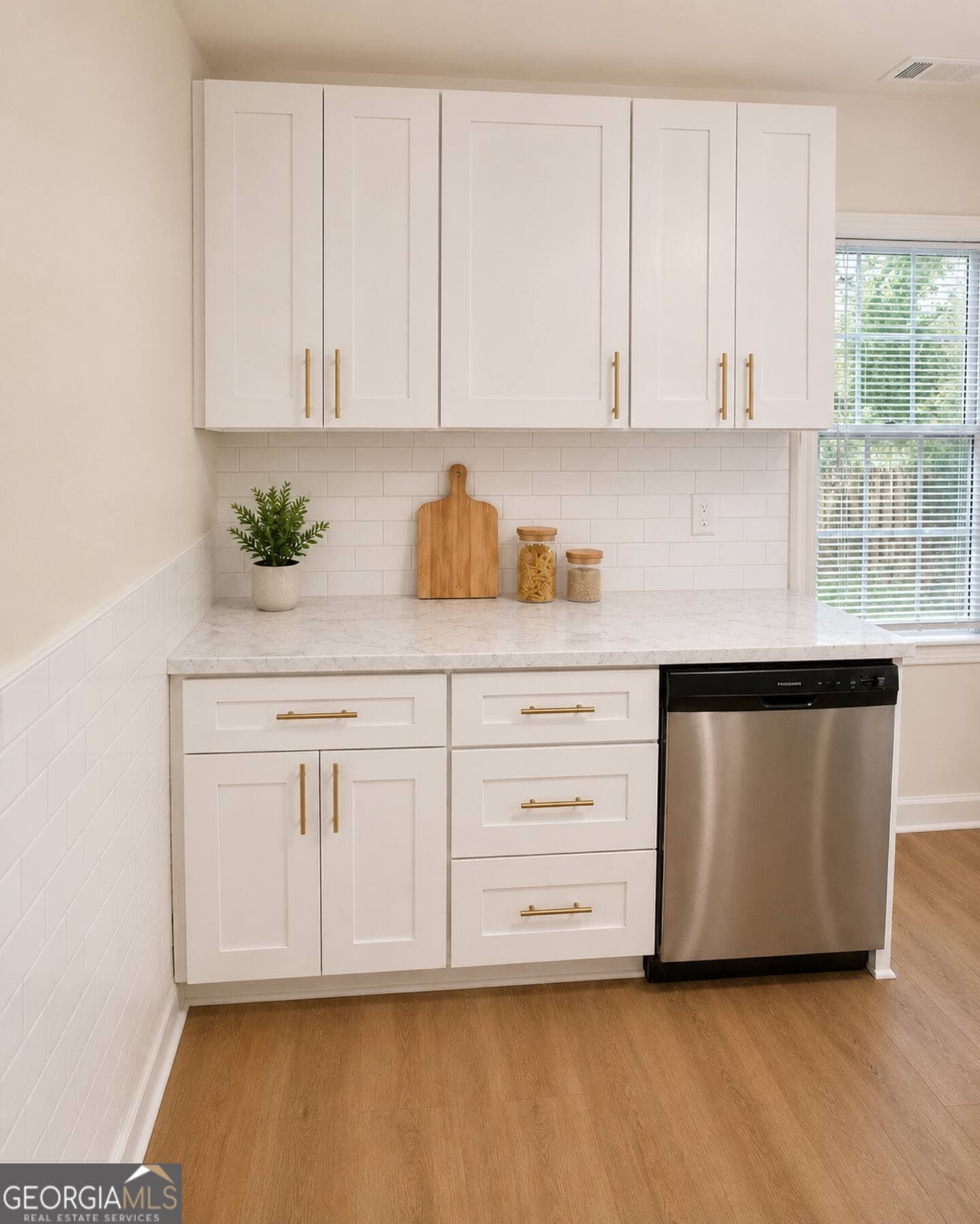 3 bedroom, 2 bathroom single family residence for sale at 2097 Baker Road, Atlanta, GA 30318 — photo 5