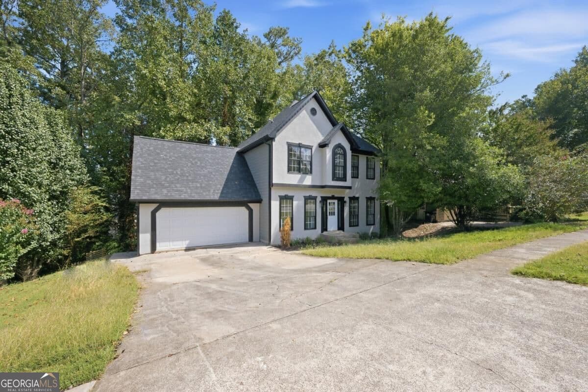 5 bedroom, 3 bathroom, 2,532 sq ft single family residence for sale at 2034 Spicers Lane, Woodstock, GA 30189 — photo 2