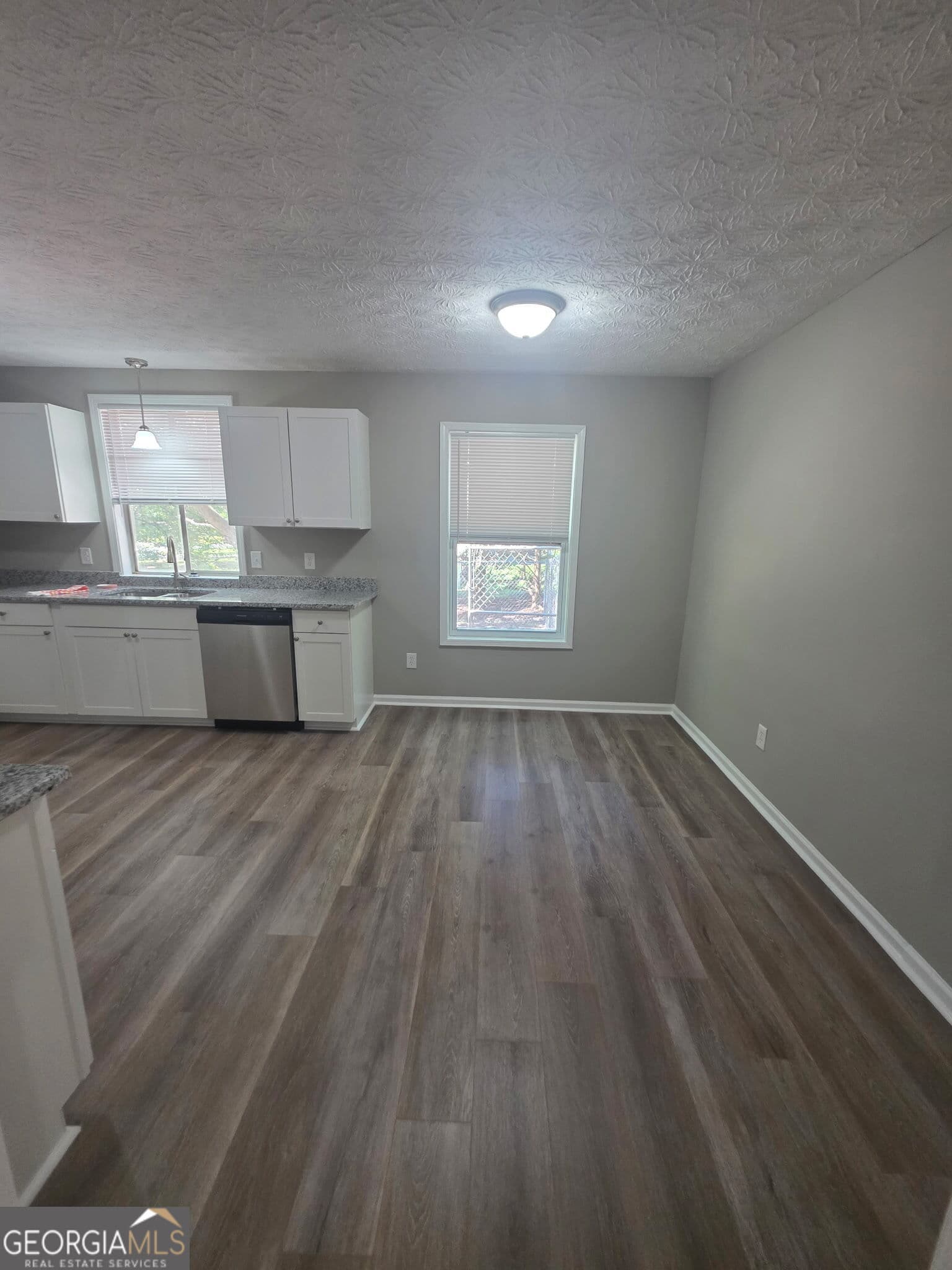 4 bedroom, 2 bathroom, 1,625 sq ft single family residence for sale at 3555 Irvin Drive, Loganville, GA 30052 — photo 7