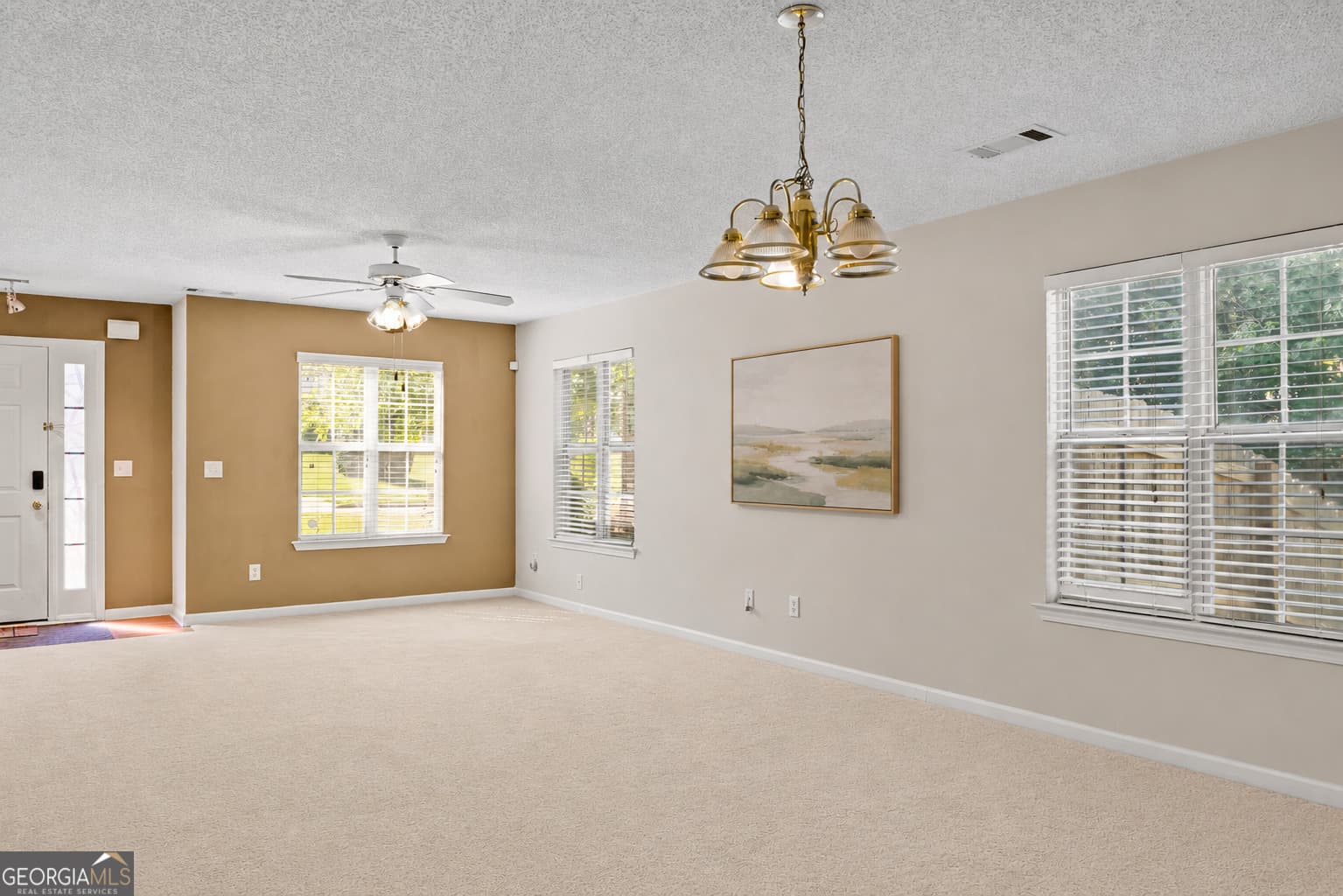 5 bedroom, 3 bathroom, 1,948 sq ft single family residence for sale at 1952 Boatswain Drive, Hampton, GA 30228 — photo 3