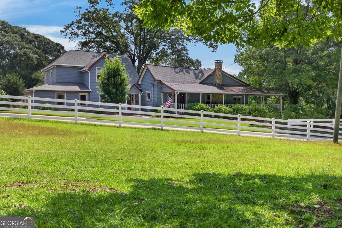 6 bedroom, 3.5 bathroom, 3,683 sq ft single family residence for sale at 1111 Bakers Bridge Road, Douglasville, GA 30134 — photo 6