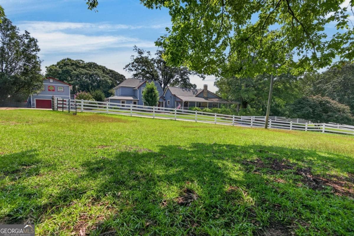 6 bedroom, 3.5 bathroom, 3,683 sq ft single family residence for sale at 1111 Bakers Bridge Road, Douglasville, GA 30134 — photo 5