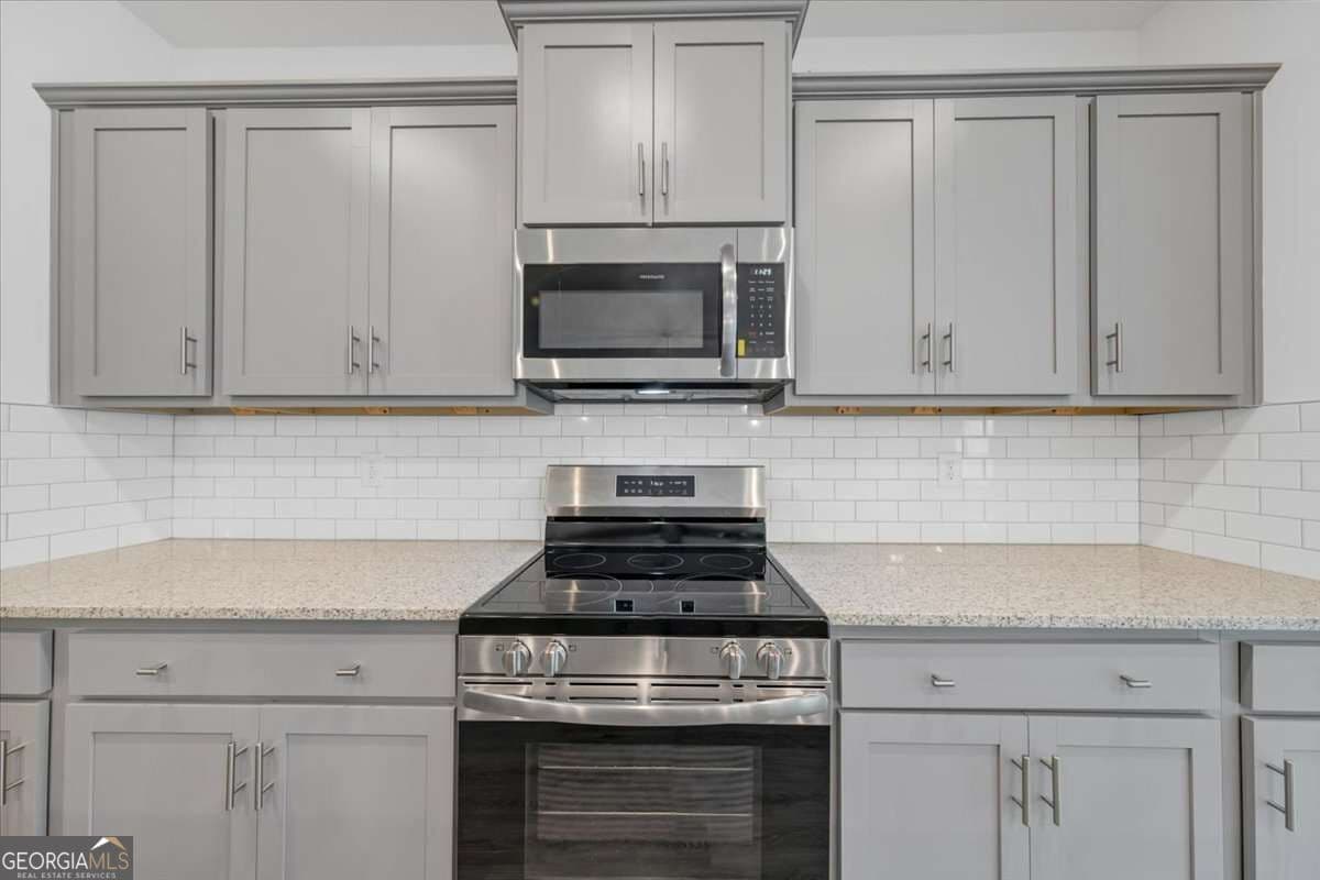 4 bedroom, 2.5 bathroom, 2,328 sq ft single family residence for sale at 313 Angela Avenue LOT 05, Bowdon, GA 30108 — photo 7