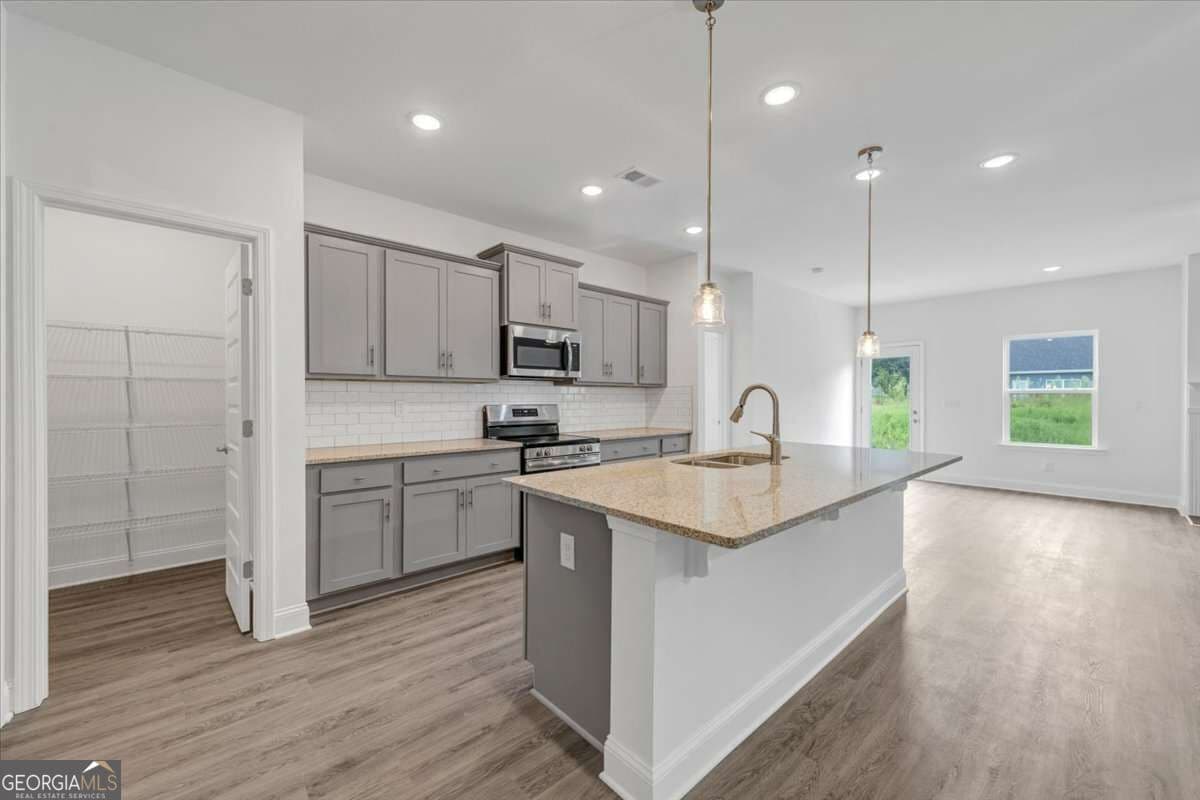 4 bedroom, 2.5 bathroom, 2,328 sq ft single family residence for sale at 313 Angela Avenue LOT 05, Bowdon, GA 30108 — photo 5