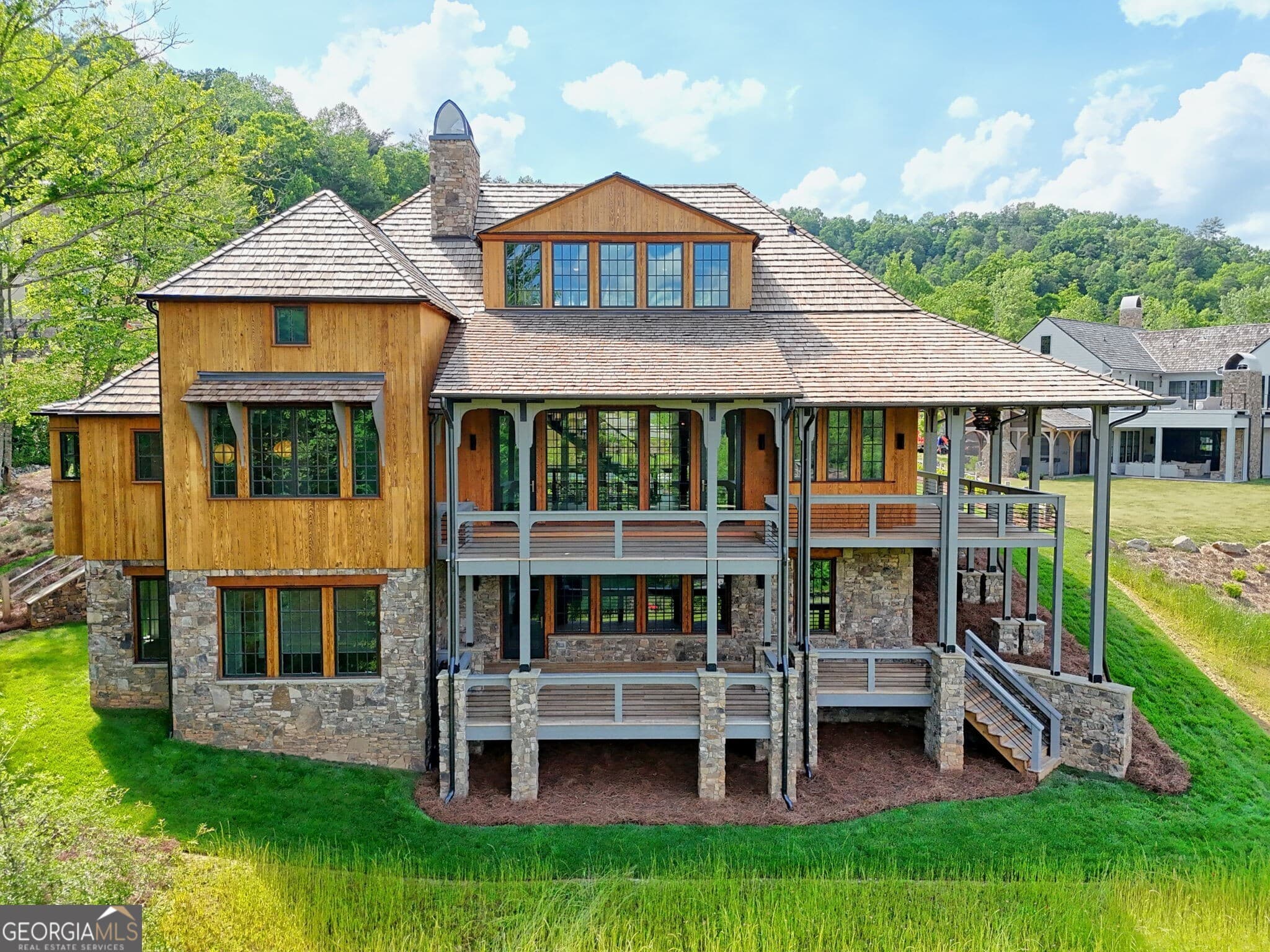 4 bedroom, 5.5 bathroom, 4,942 sq ft single family residence for sale at 140 Cove View Lane, Clarkesville, GA 30523 — photo 2