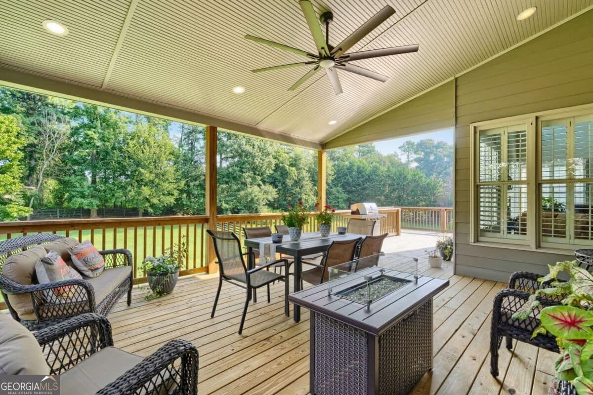 6 bedroom, 5 bathroom, 4,709 sq ft single family residence for sale at 5680 Cascade Trail, Cumming, GA 30040 — photo 2