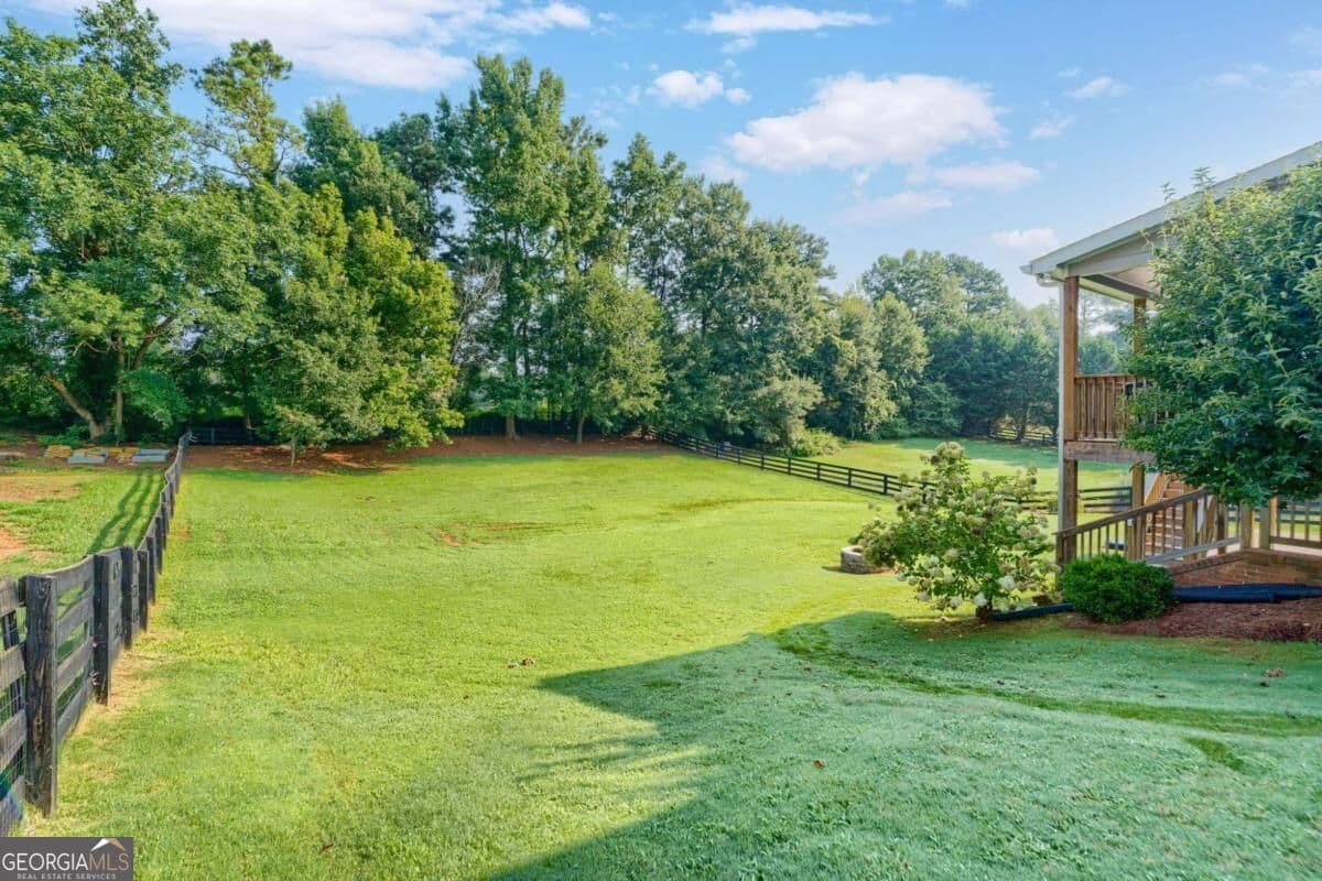 6 bedroom, 5 bathroom, 4,709 sq ft single family residence for sale at 5680 Cascade Trail, Cumming, GA 30040 — photo 3