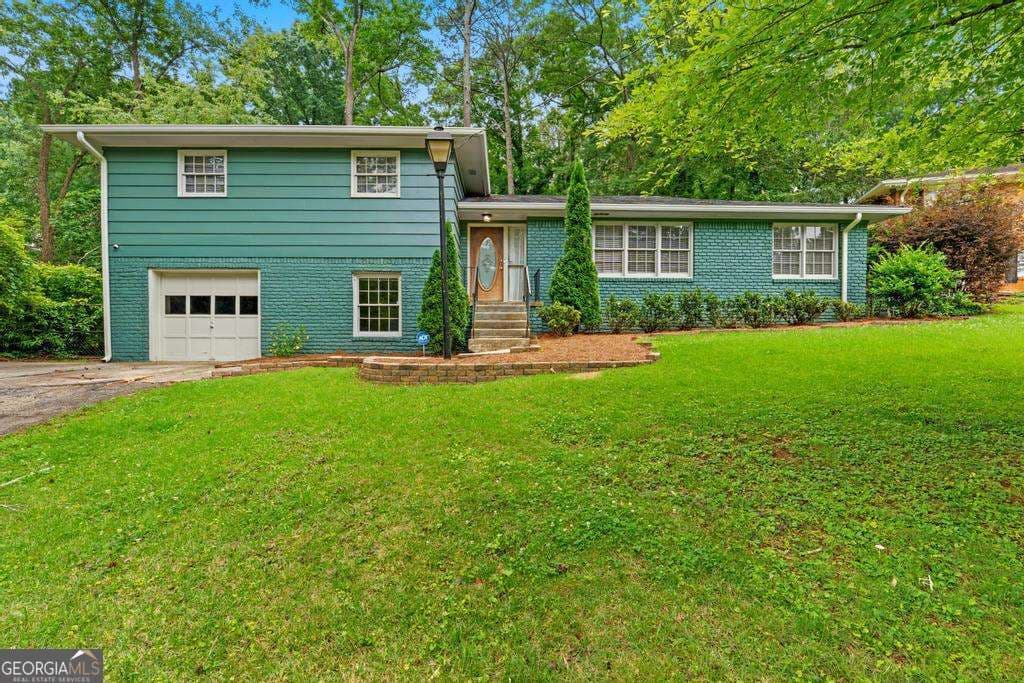4 bedroom, 3 bathroom, 3,200 sq ft single family residence sold at 2335 Tilson Circle, Decatur, GA 30032